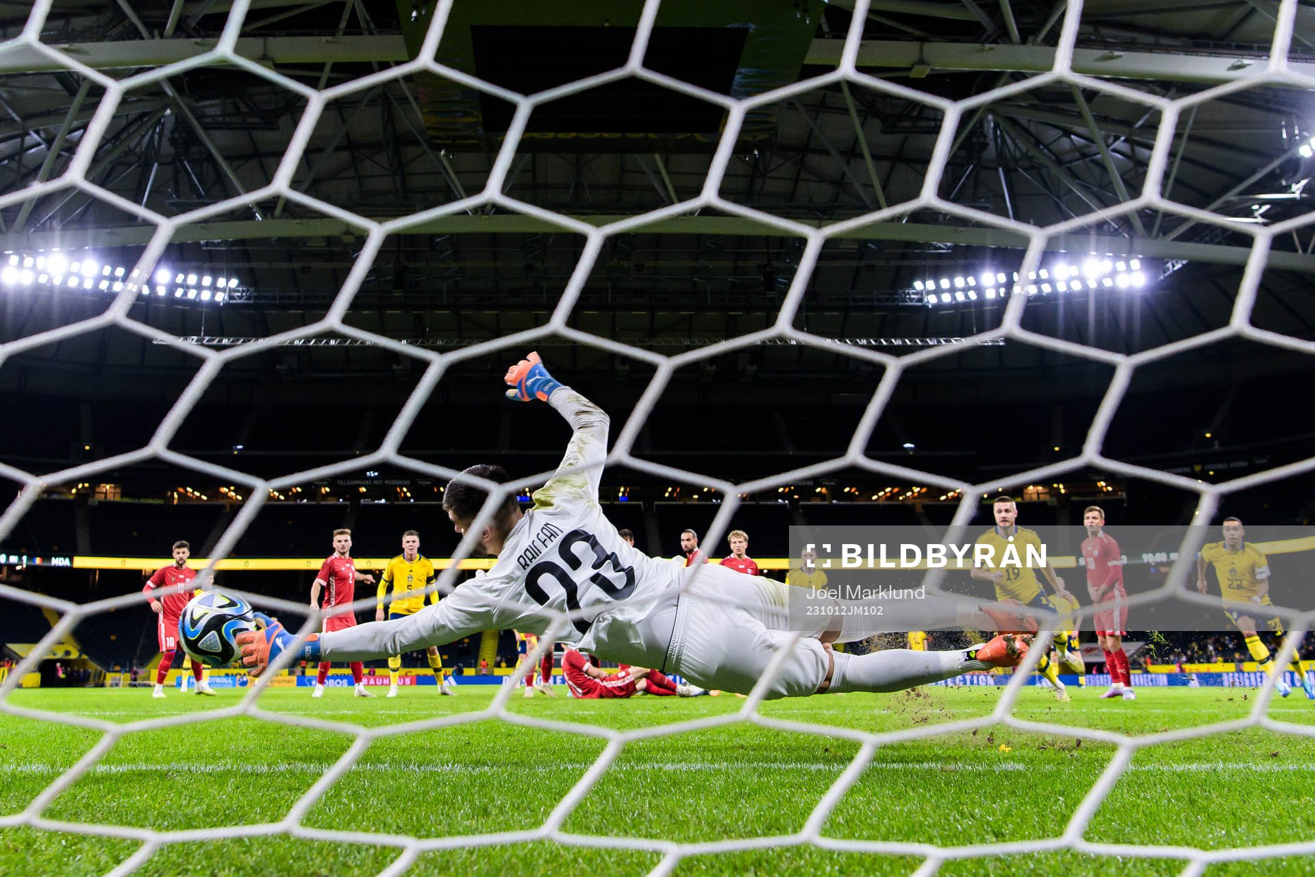 Goalkeeper Dorian Railean of Moldova saves a free kick