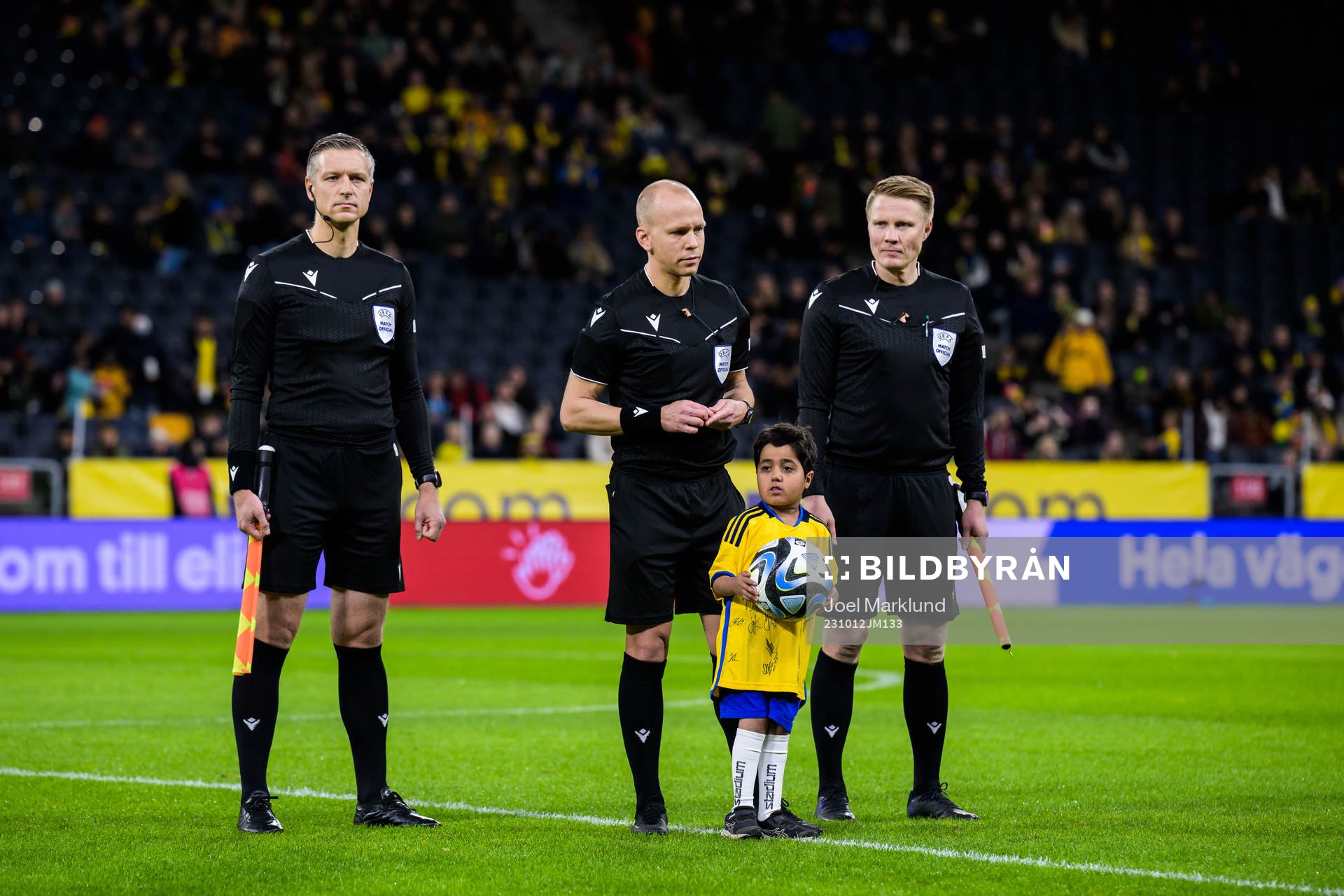 Assistant referee Jukka Honkanen, referee Antti Munukka and