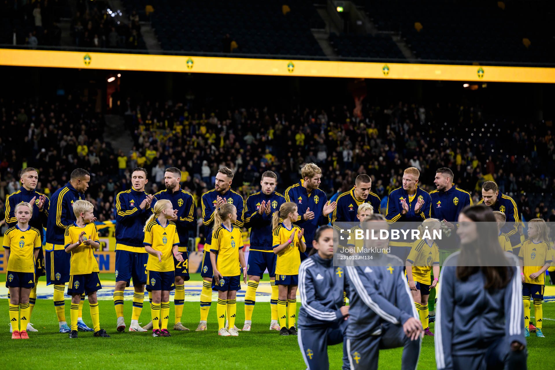Players of Sweden cheer