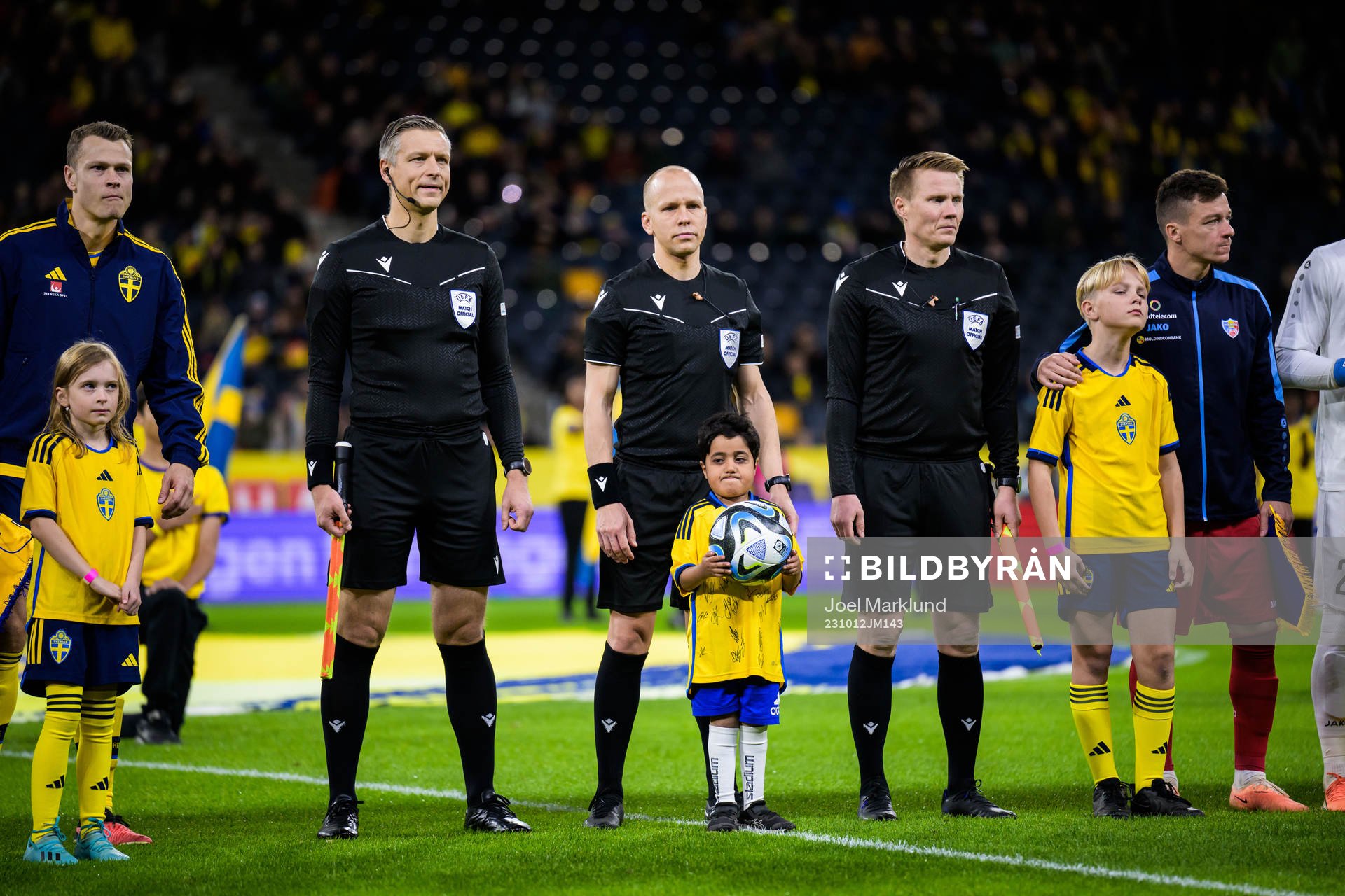 Assistant referee Jukka Honkanen, referee Antti Munukka and