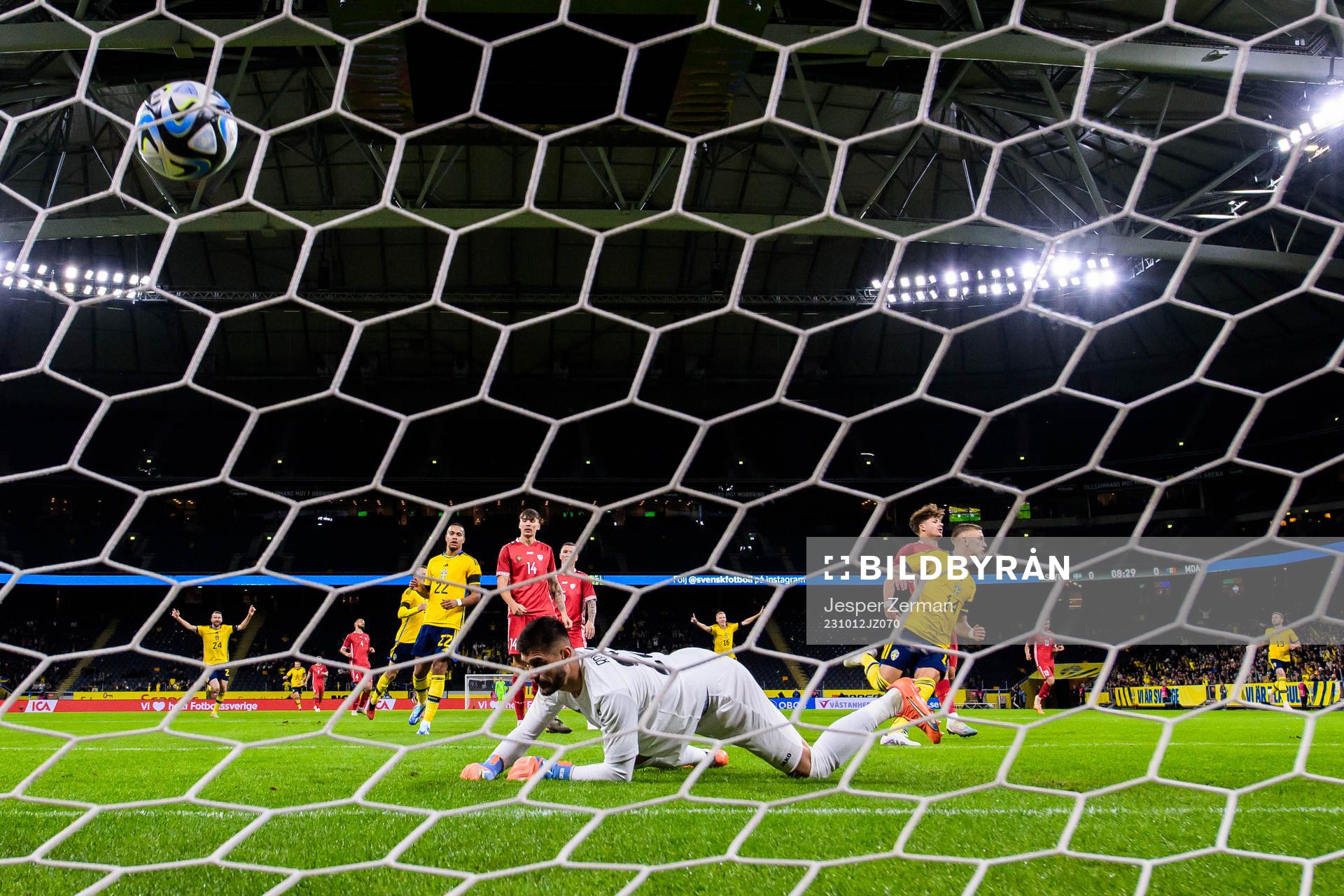 Jesper Karlsson of Sweden scores 1-0 behind  Dorian Railean