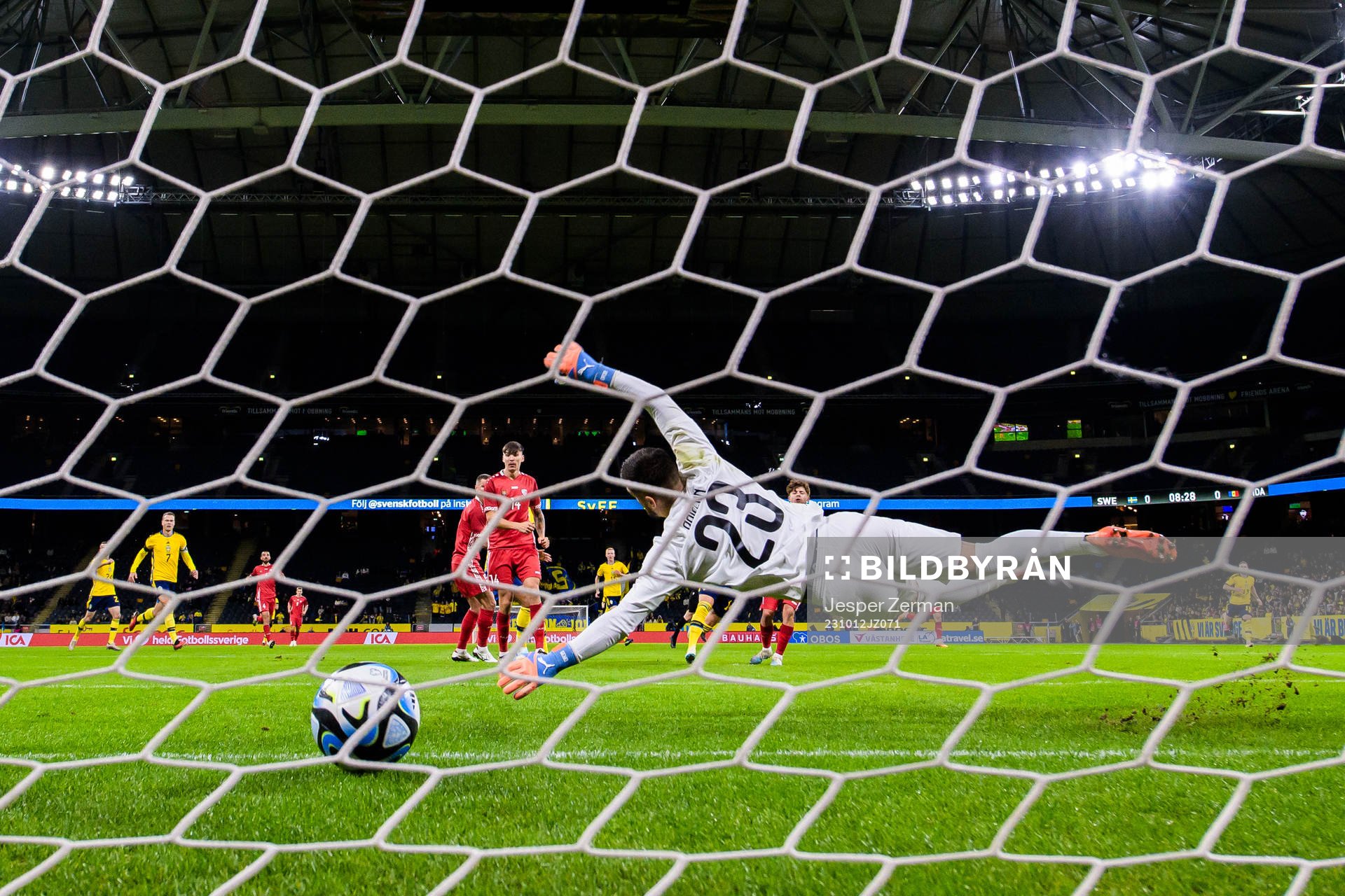 Jesper Karlsson of Sweden scores 1-0 behind  Dorian Railean