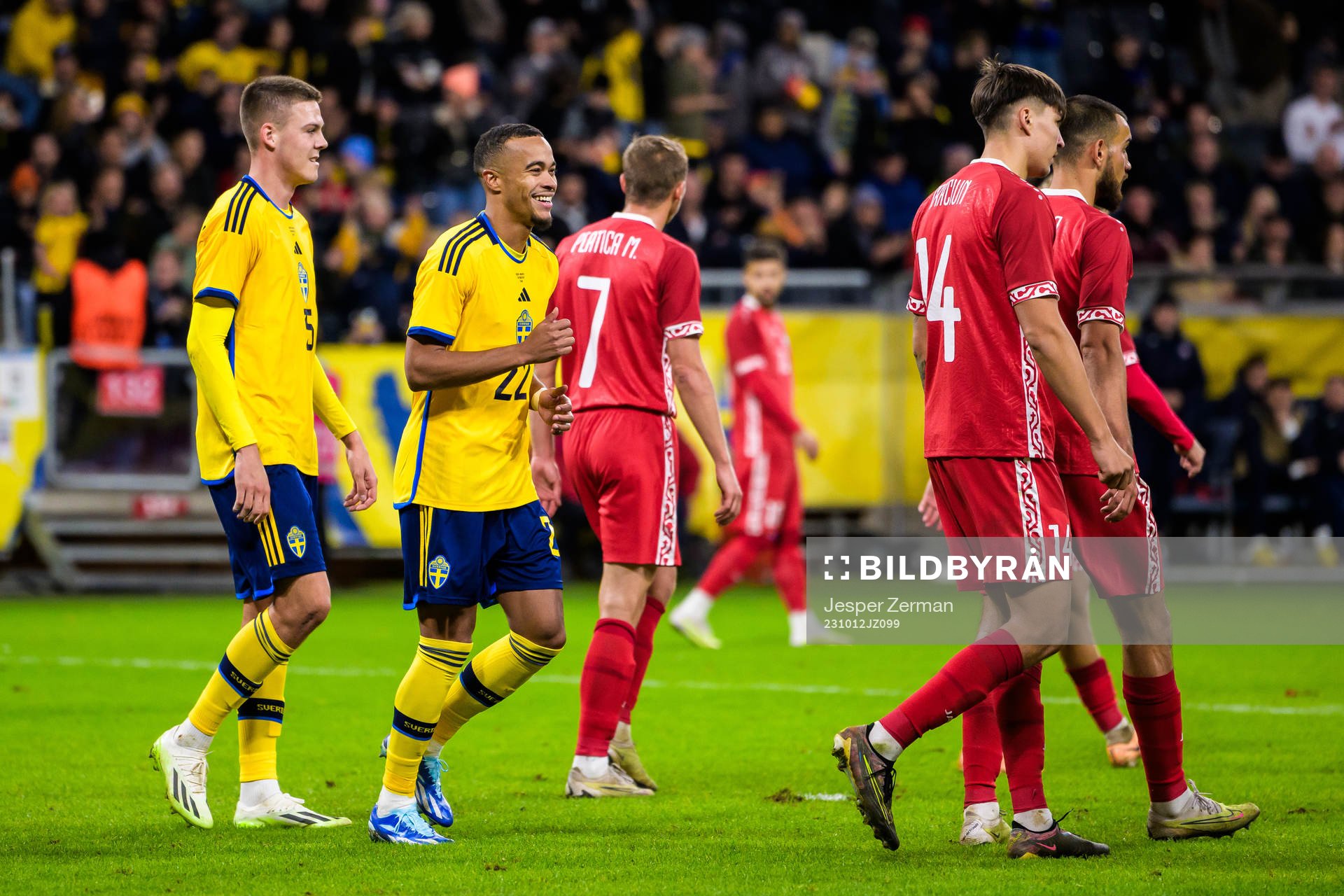 Robin Quaison and Jesper Karlsson of Sweden celebrating 3-1