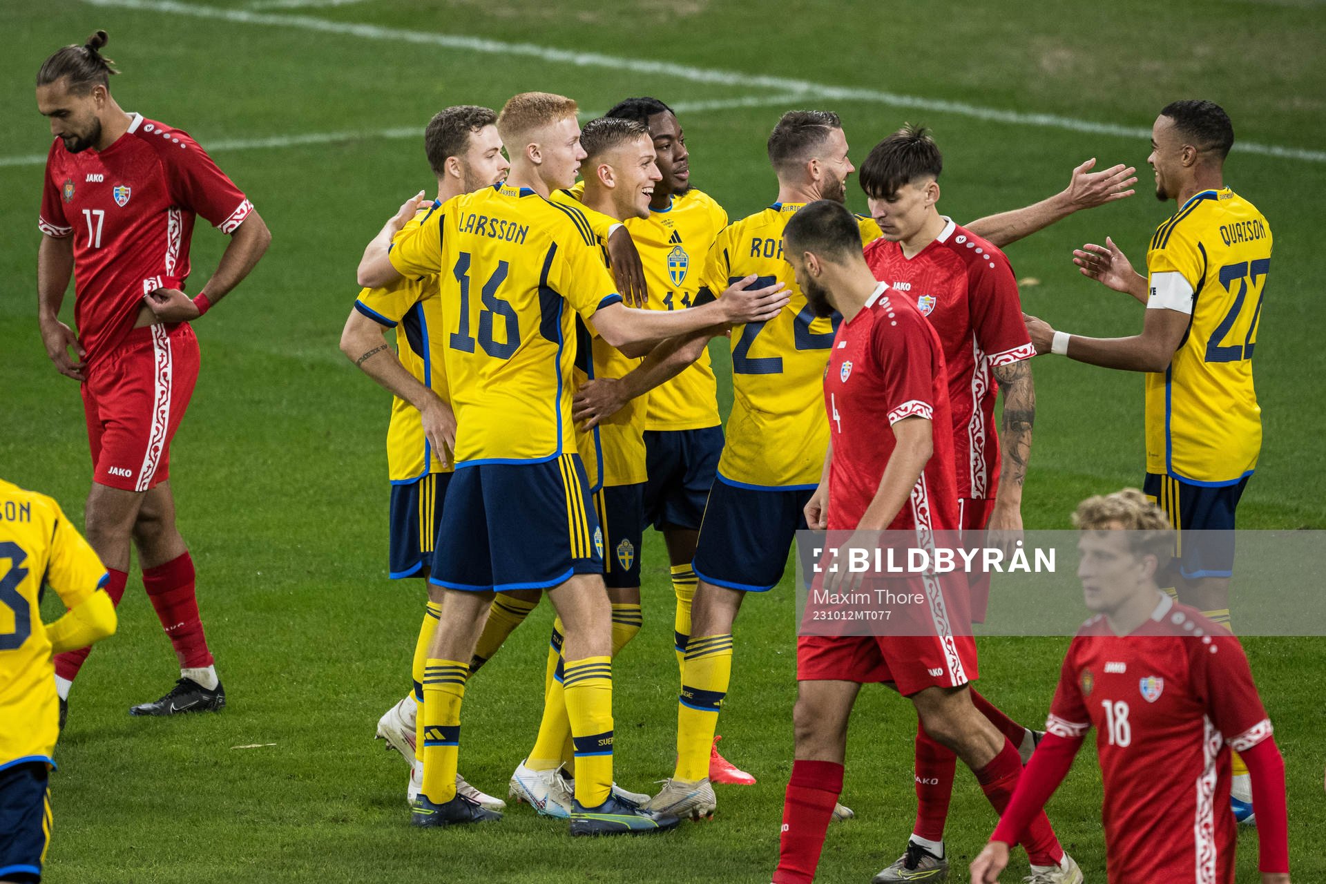 Jesper Karlsson and Robin Quaison of Sweden celebrating 3-1