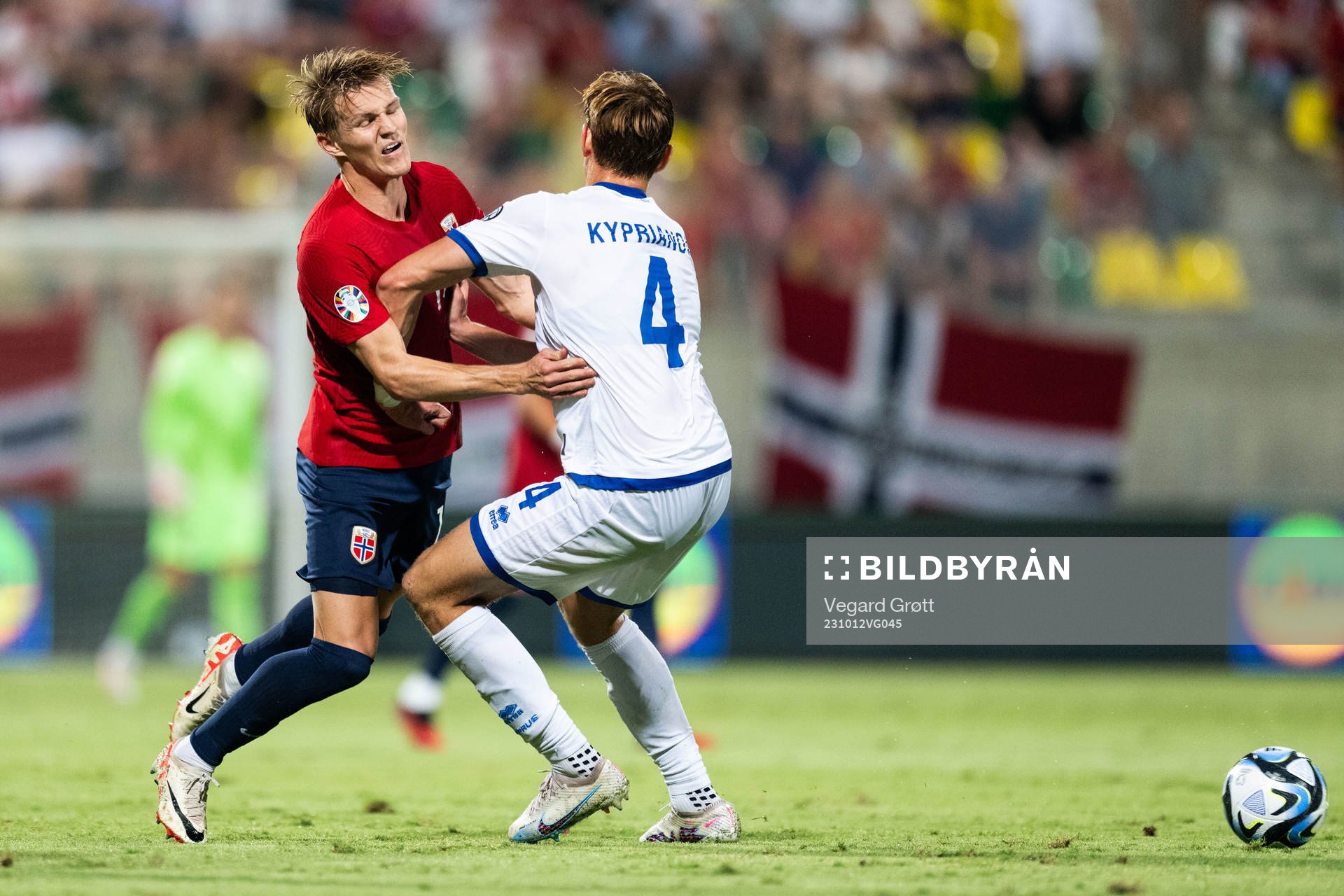 Martin Ødegaard of Norway and Hector Kyprianou of Cyprus