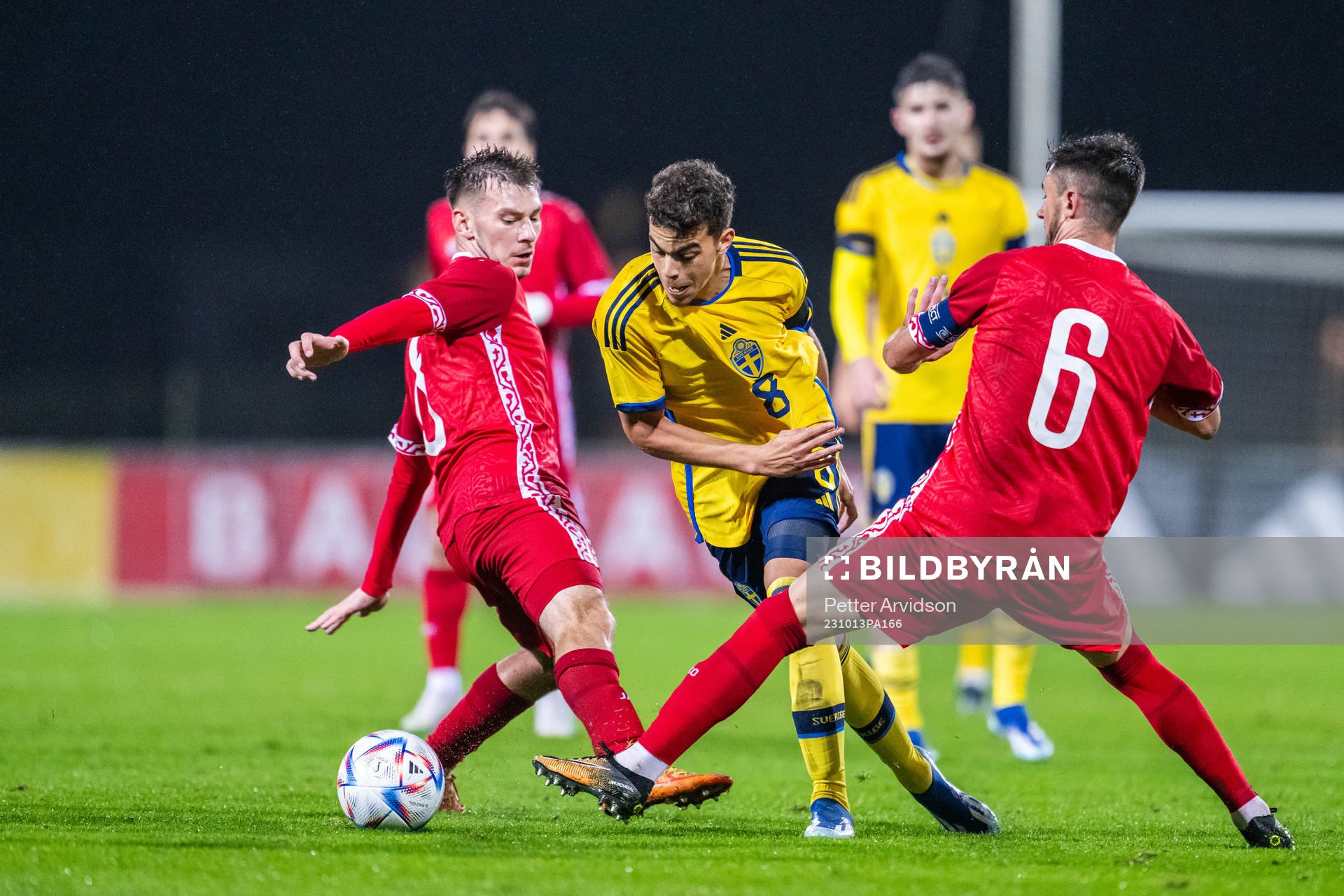 Yasin Ayari of Sweden competes for the ball with Vicu