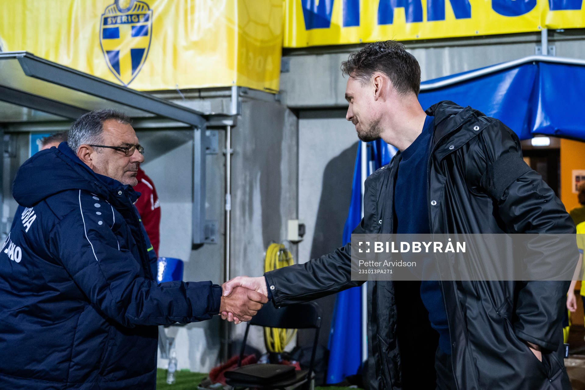 Head coach Stefan Stoica of Moldova and head coach Daniel