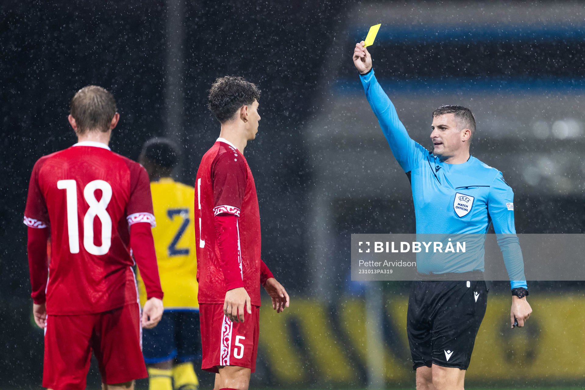 Referee Trustin Farrugia Cann give a yellow card to Doru