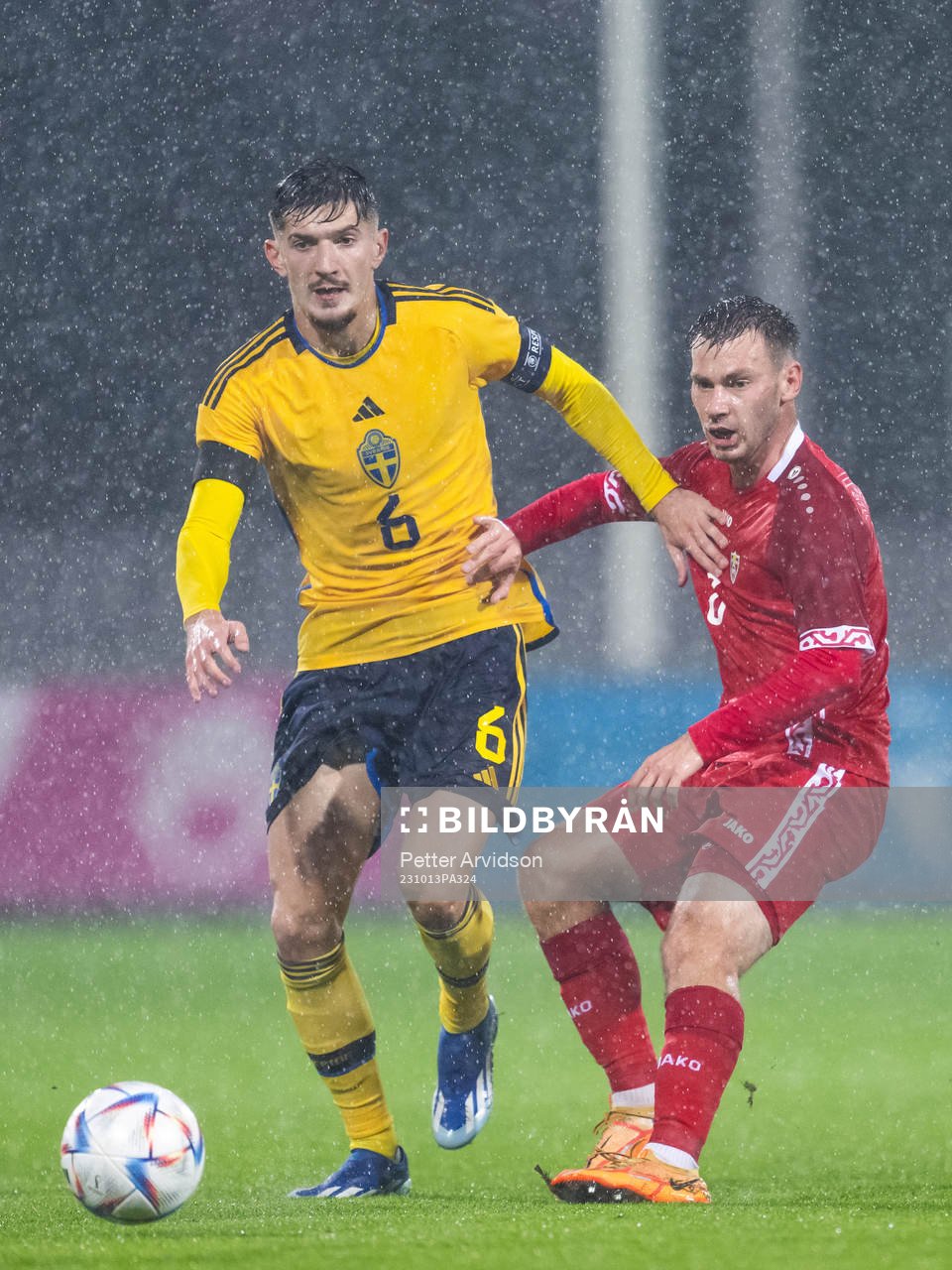 Armin Gigovic of Sweden and Vicu Bulmaga of Moldova during the UEFA European Under-21 Qualifier football match between Sweden and Moldova on October 13, 2023 in Falkenberg.
