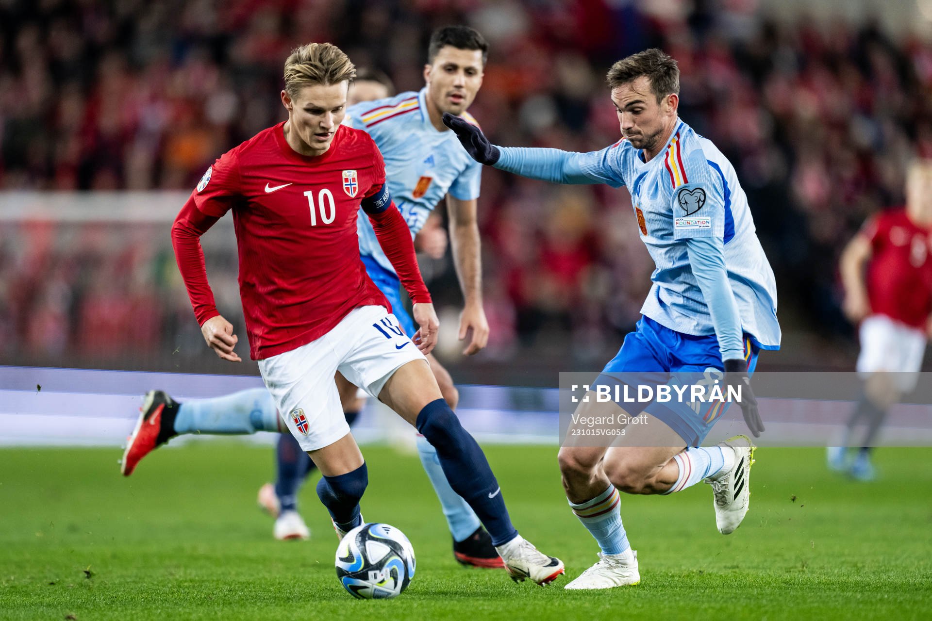 Martin Ødegaard of Norway and Fabián Ruiz of Spain