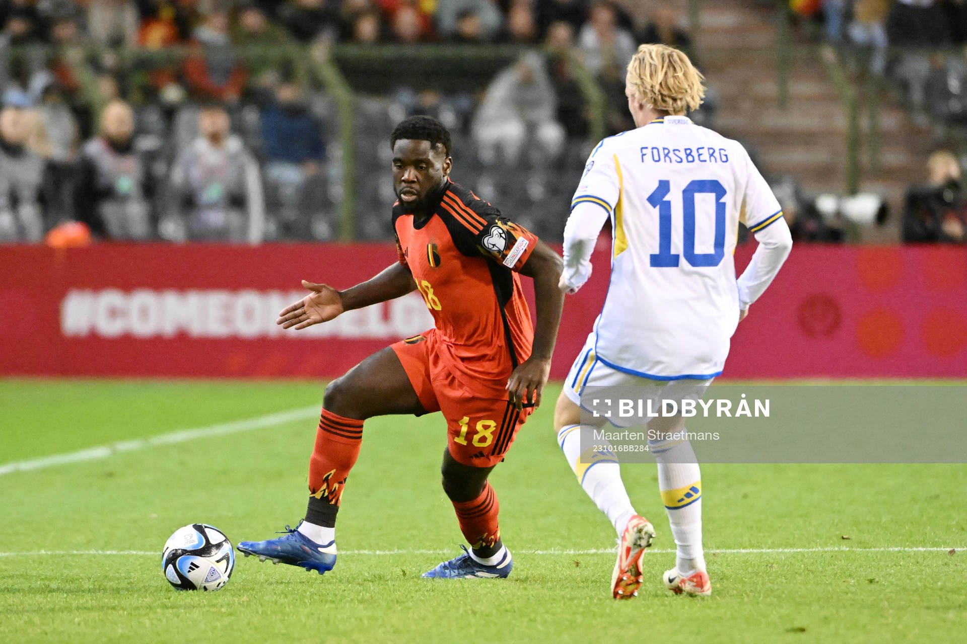Orel Mangala of Belgium battles for the ball with Emil