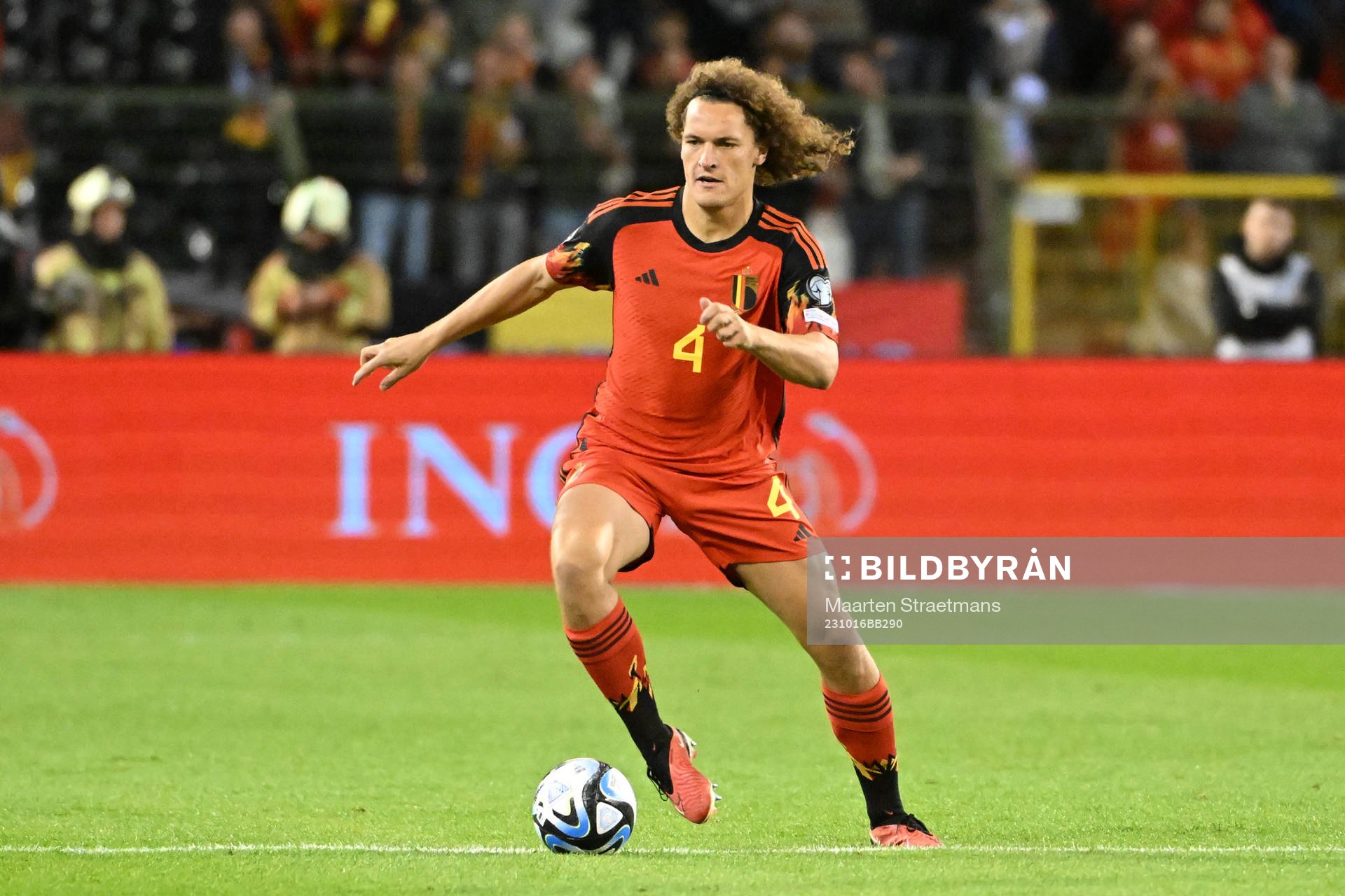 Wout Faes of Belgium in action with the ball