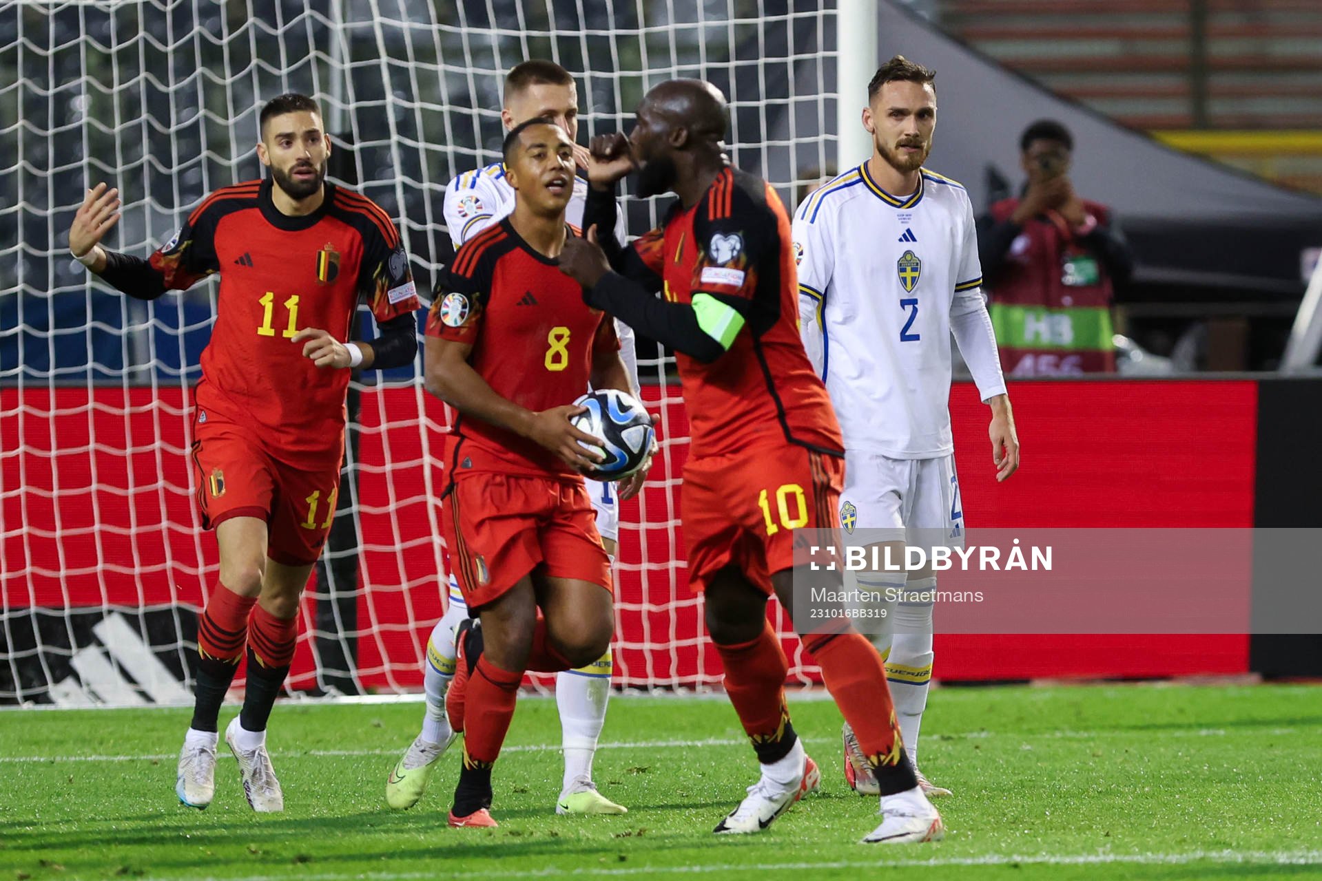 Romelu Lukaku of Belgium scores a penalty and celebrates
