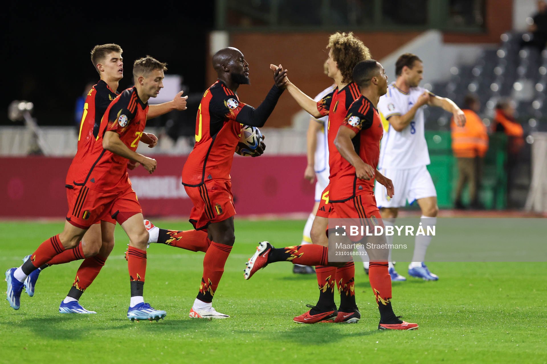 Romelu Lukaku of Belgium scores a penalty and celebrates