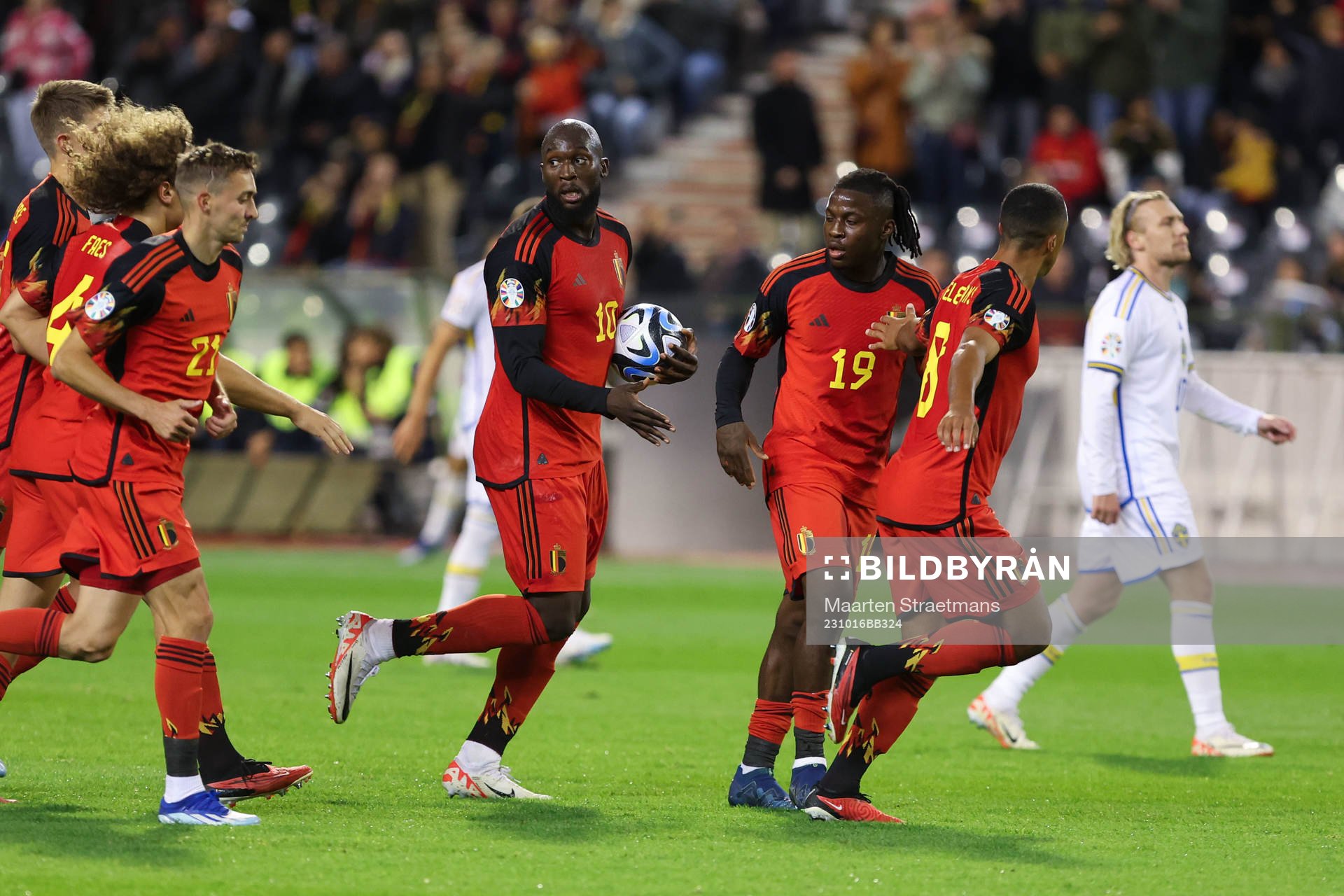 Romelu Lukaku of Belgium scores a penalty and celebrates