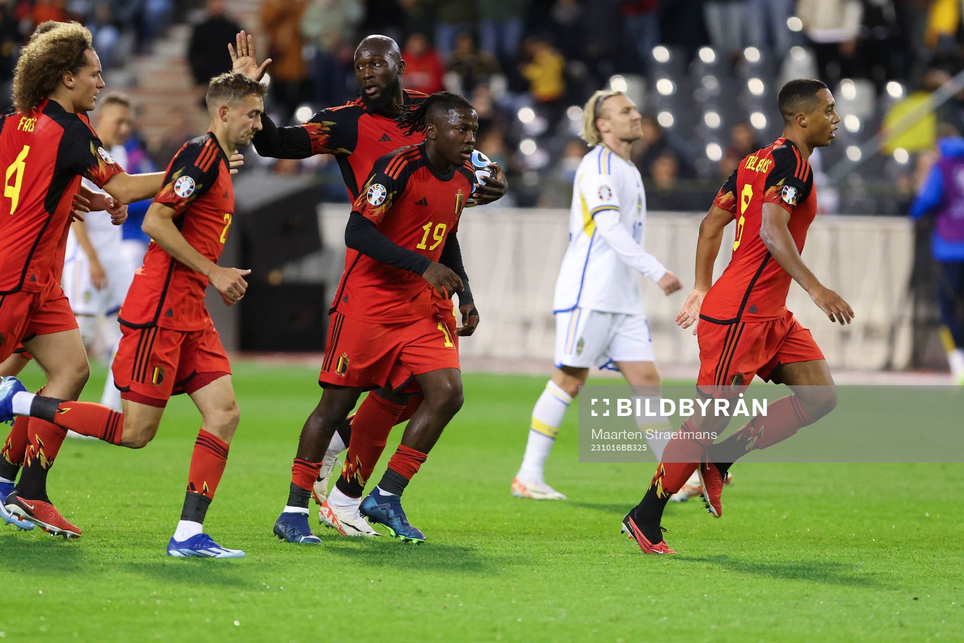 Romelu Lukaku of Belgium scores a penalty and celebrates