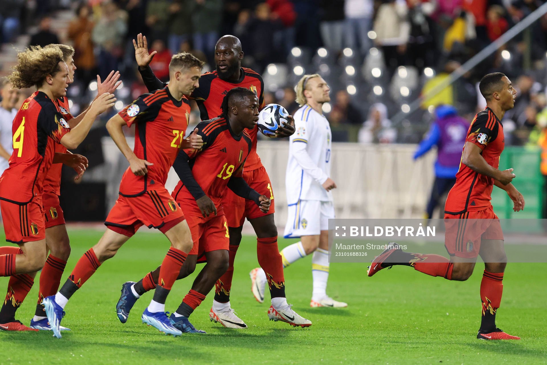 Romelu Lukaku of Belgium scores a penalty and celebrates