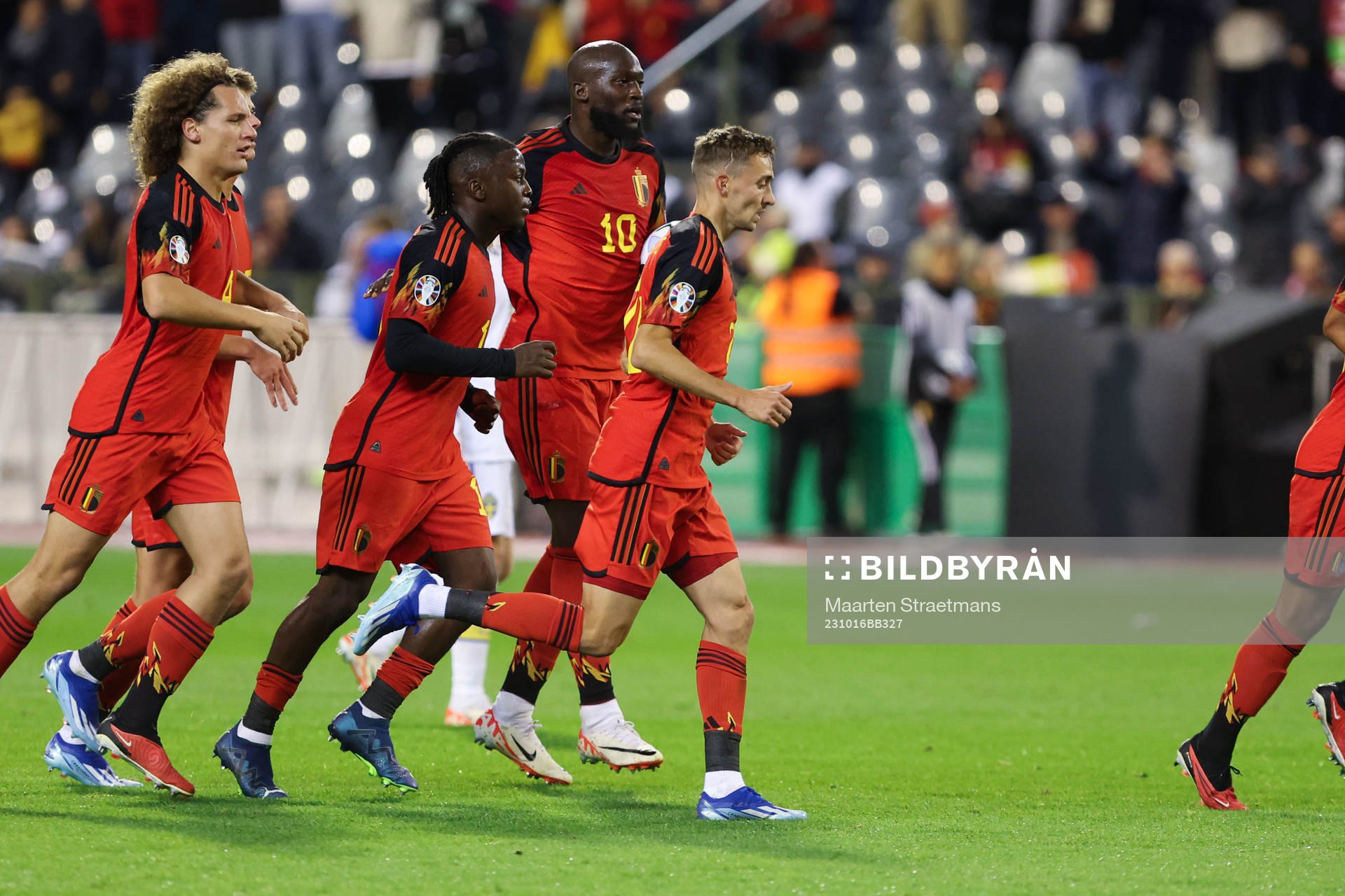 Romelu Lukaku of Belgium scores a penalty and celebrates