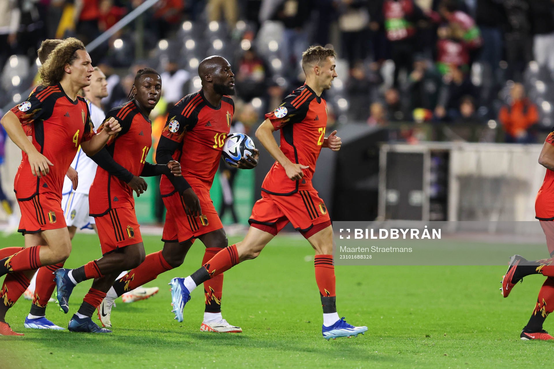 Romelu Lukaku of Belgium scores a penalty and celebrates