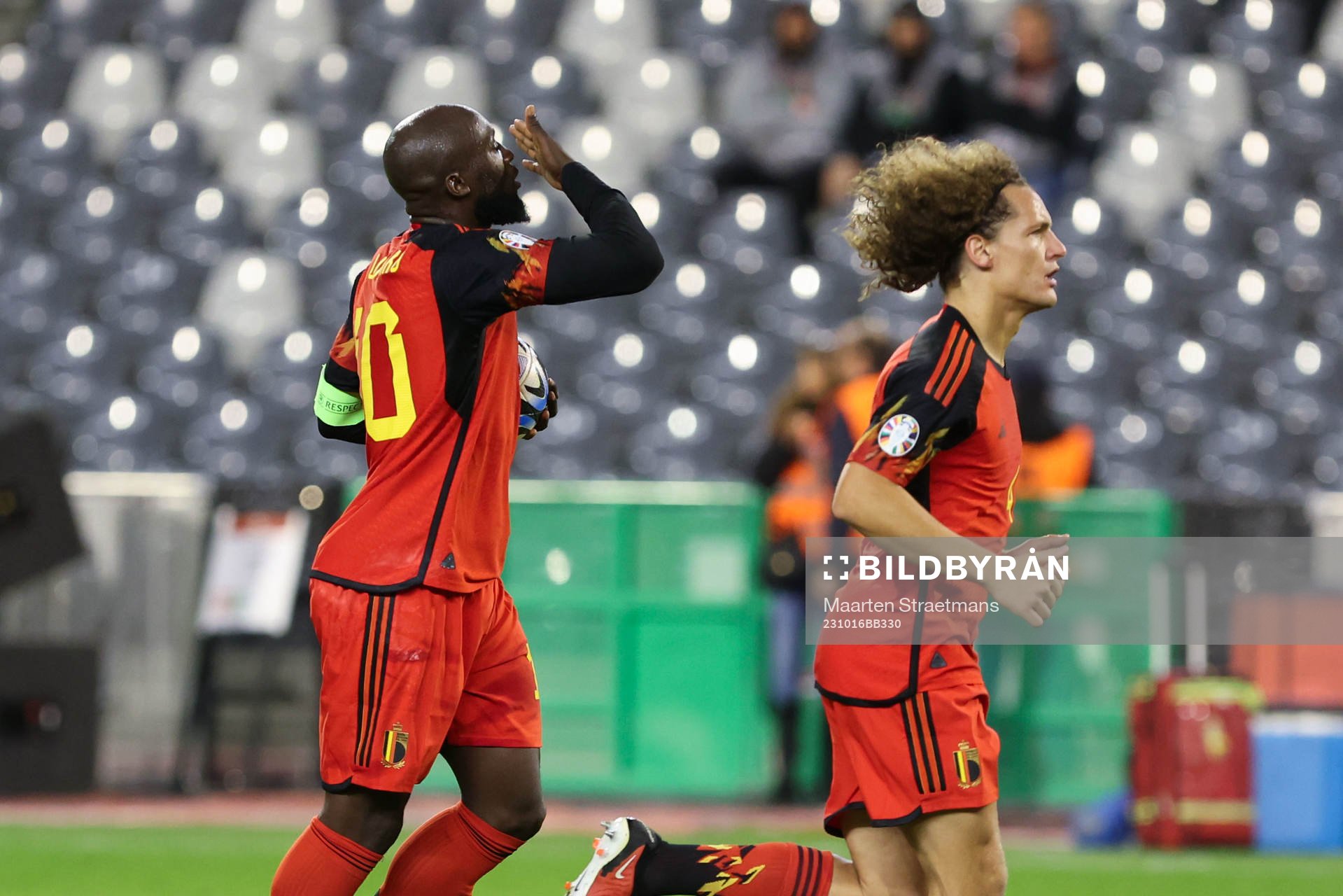 Romelu Lukaku of Belgium scores a penalty and celebrates