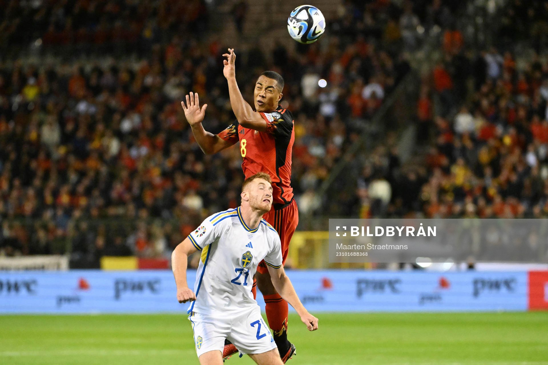 Youri Tielemans of Belgium battles for the ball with Dejan