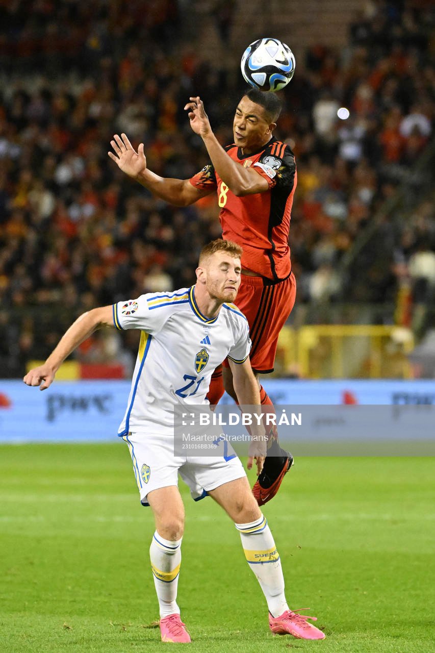 Youri Tielemans of Belgium battles for the ball with Dejan