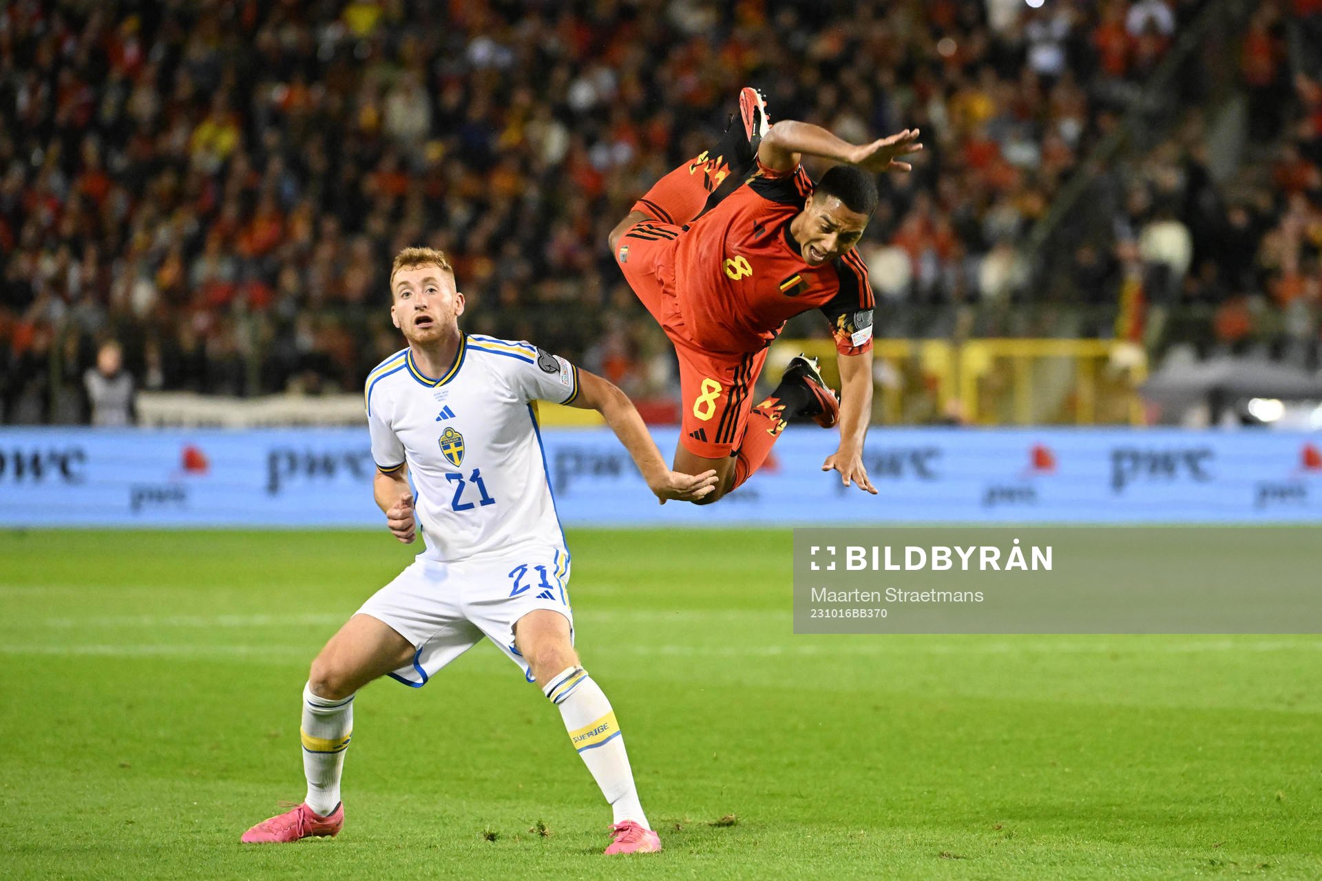Youri Tielemans of Belgium battles for the ball with Dejan