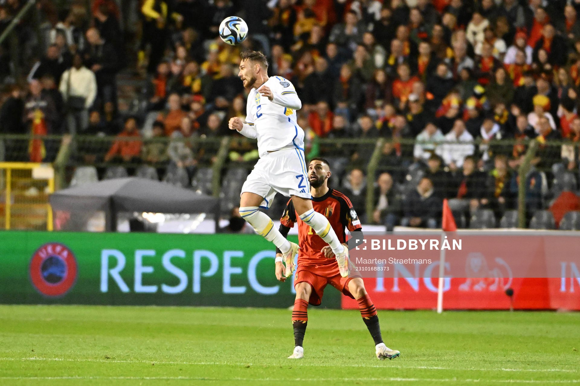 Linus Wahlqvist of Sweden battles for the ball with Yannick