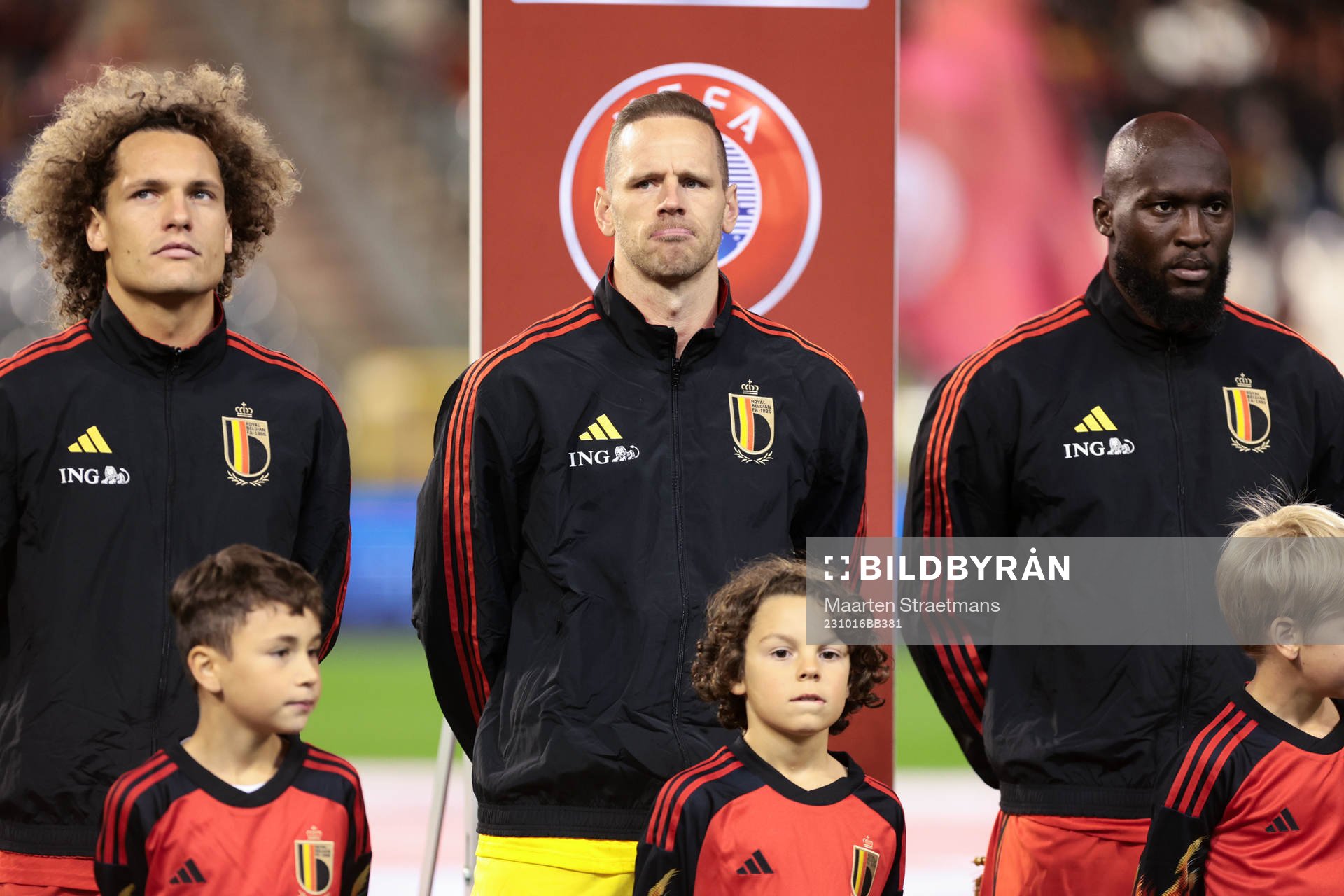 Wout Faes Matz Sels and Romelu Lukaku of Belgium