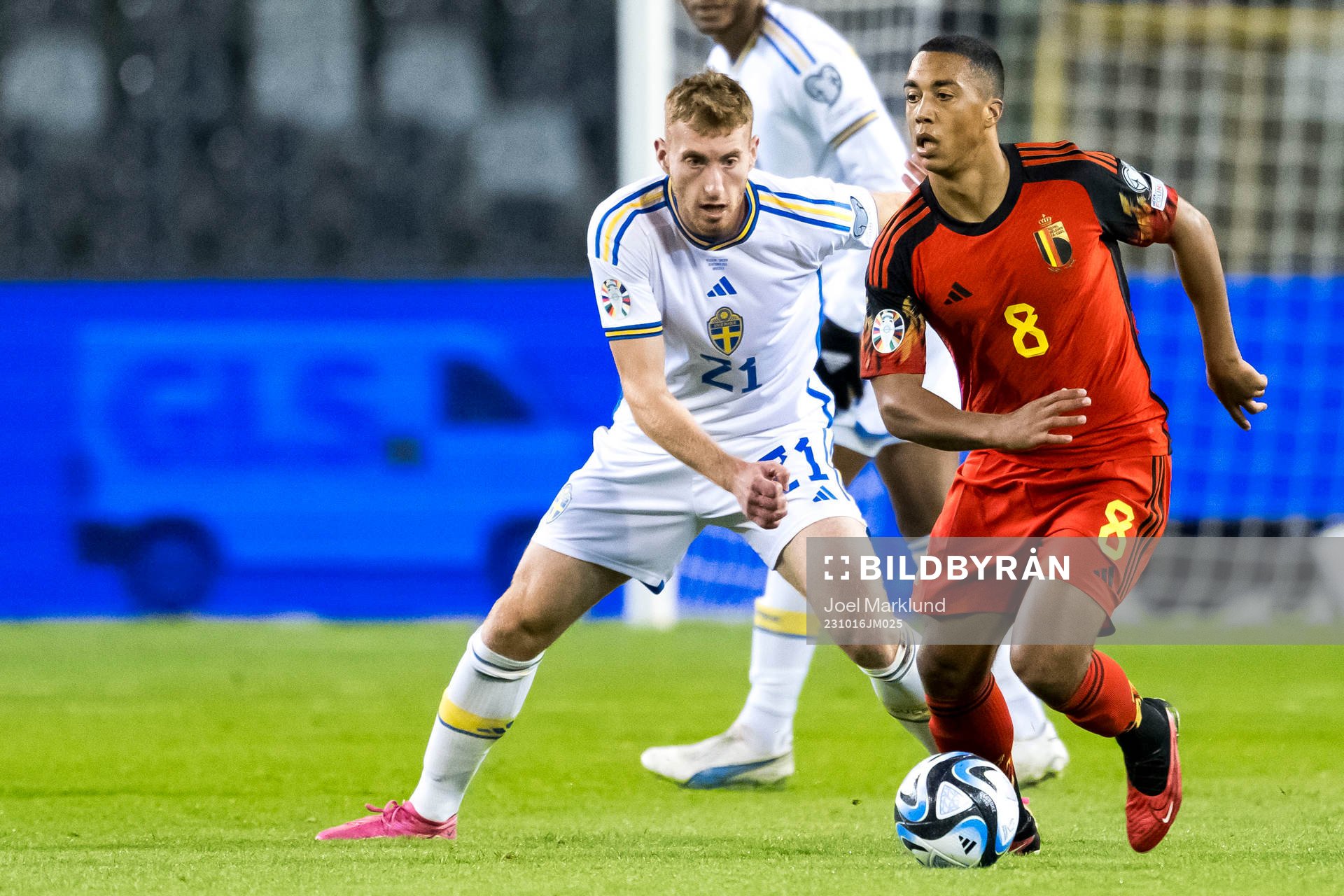 Dejan Kulusevski of Sweden and Youri Tielemans of Belgium