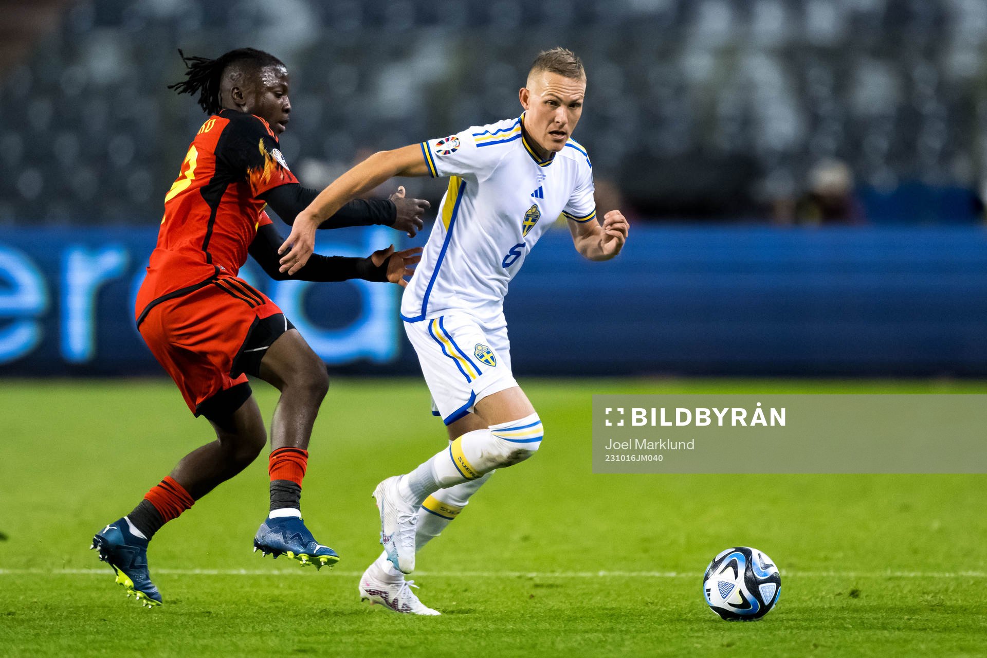 Johan Bakayoko of Belgium and Ludwig Augustinsson of Sweden