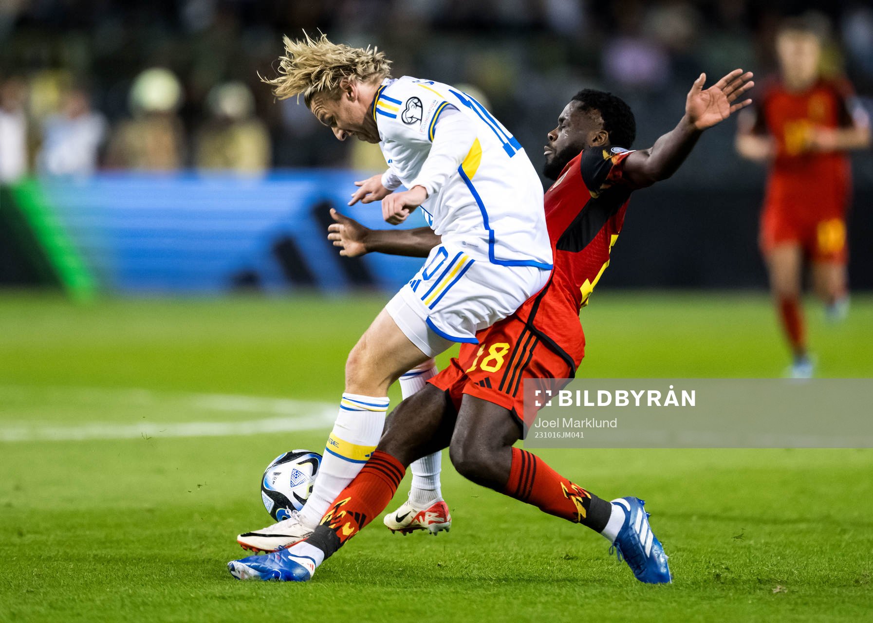 Emil Forsberg of Sweden and Orel Mangala of Belgium