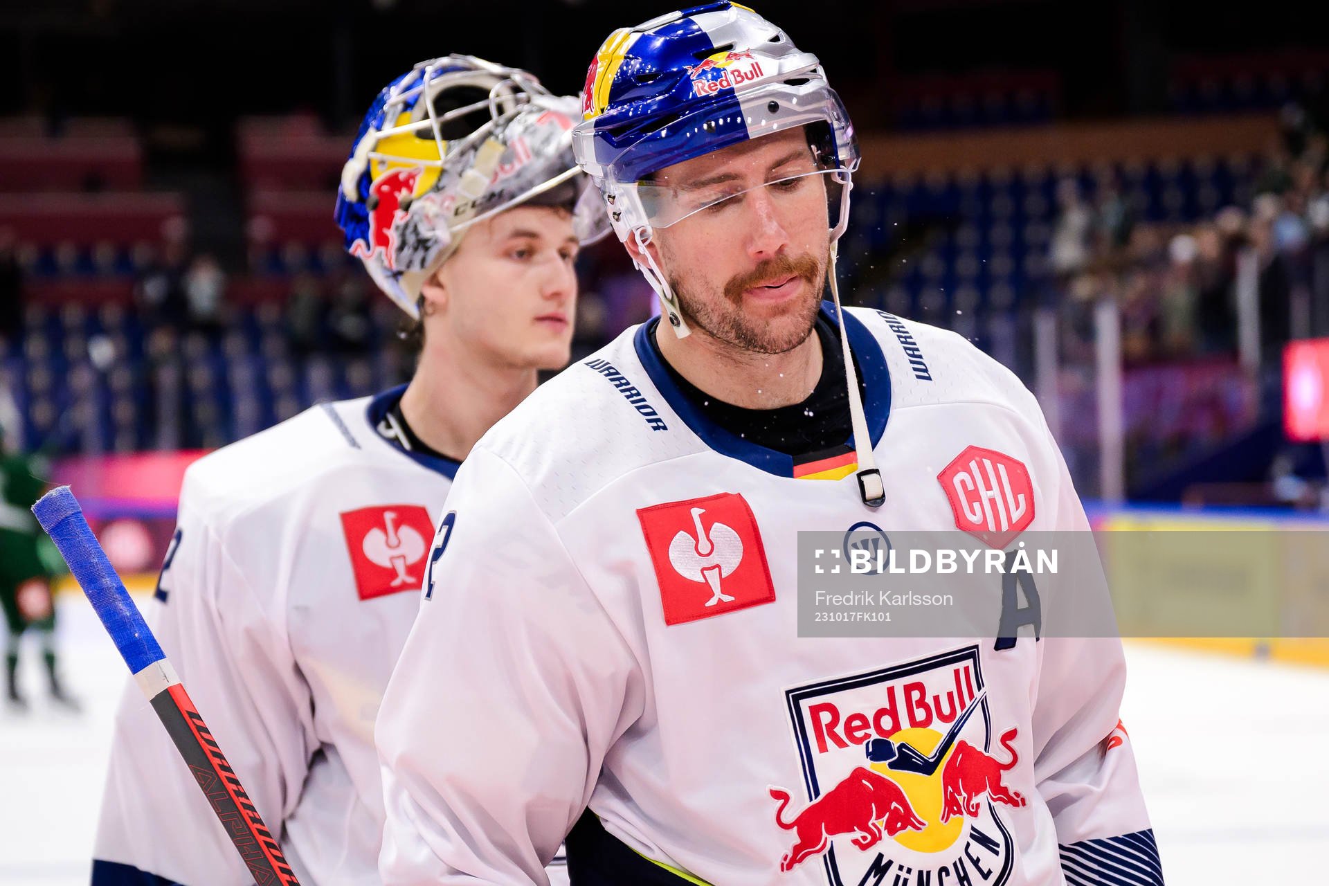 goaltender Daniel Allavena of Munich and Andrew MacWilliam