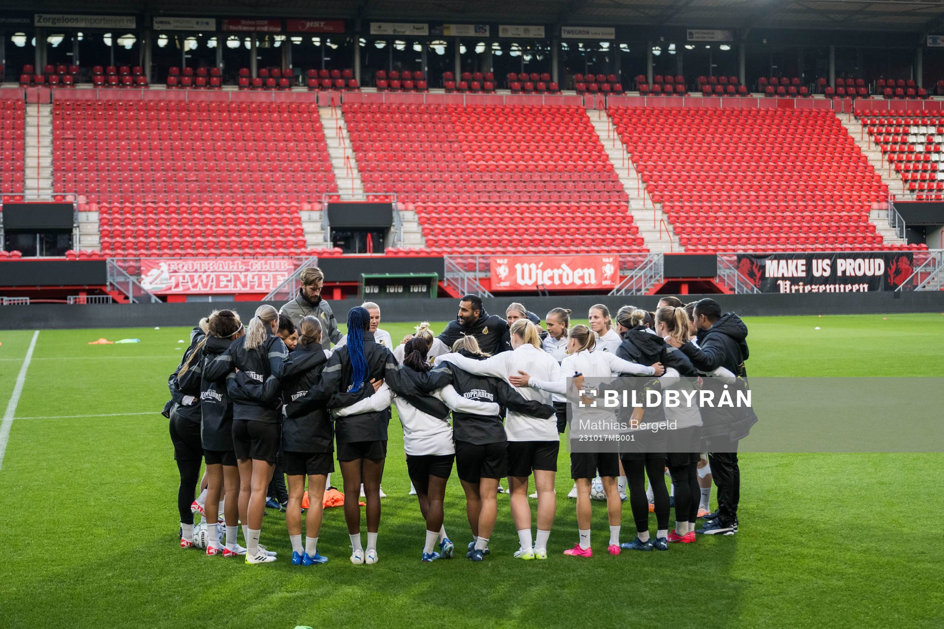 Players and staff gather