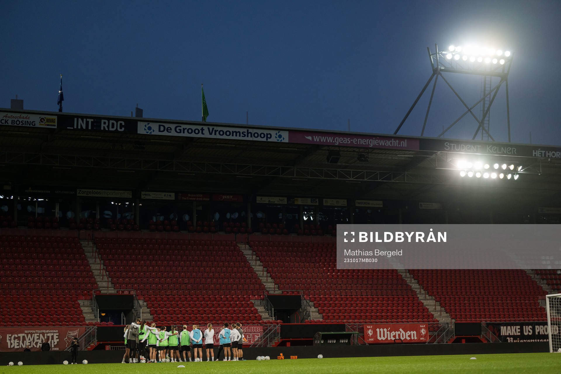 Players and staff gather