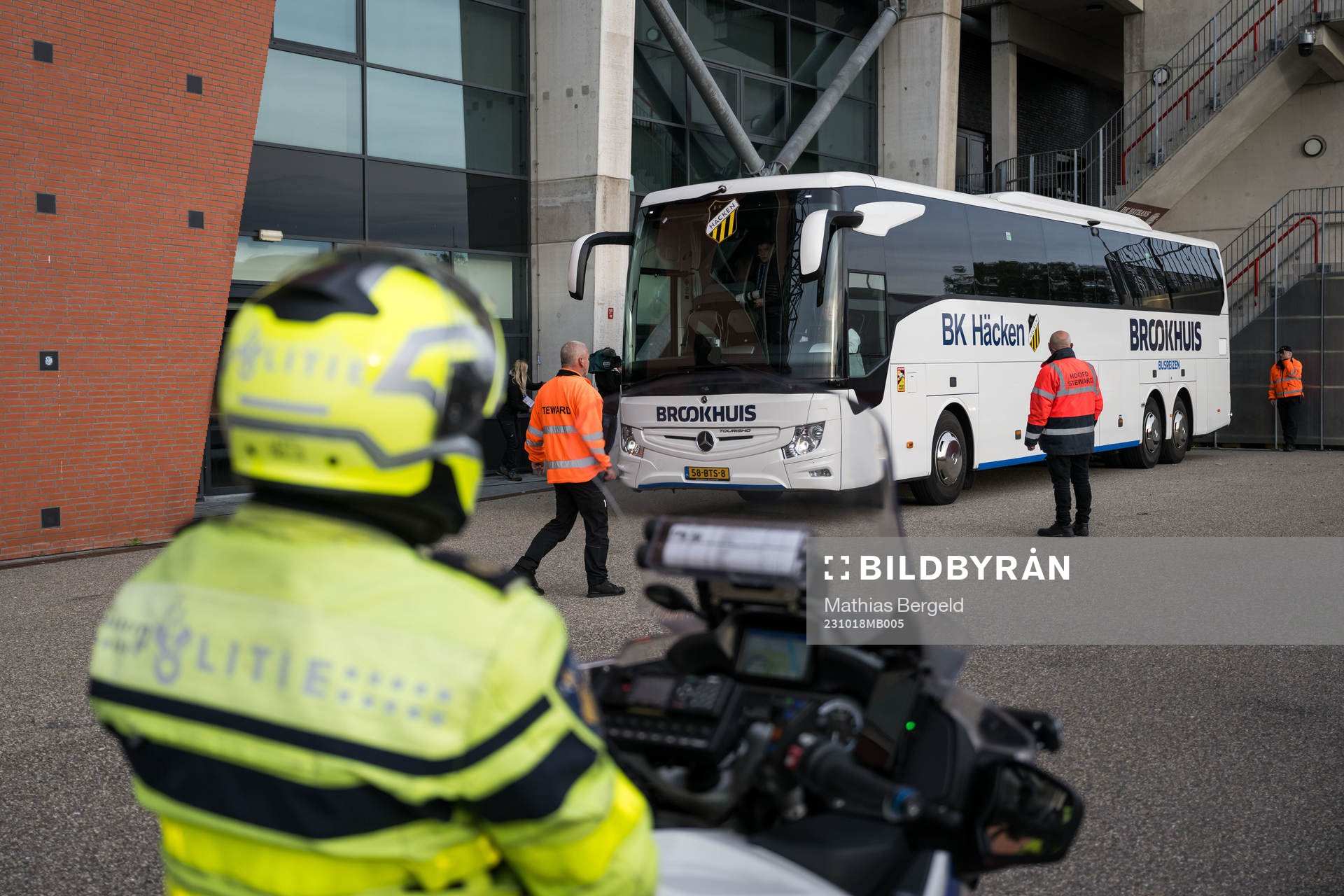 Police watch as the team bus of Häcken arrive