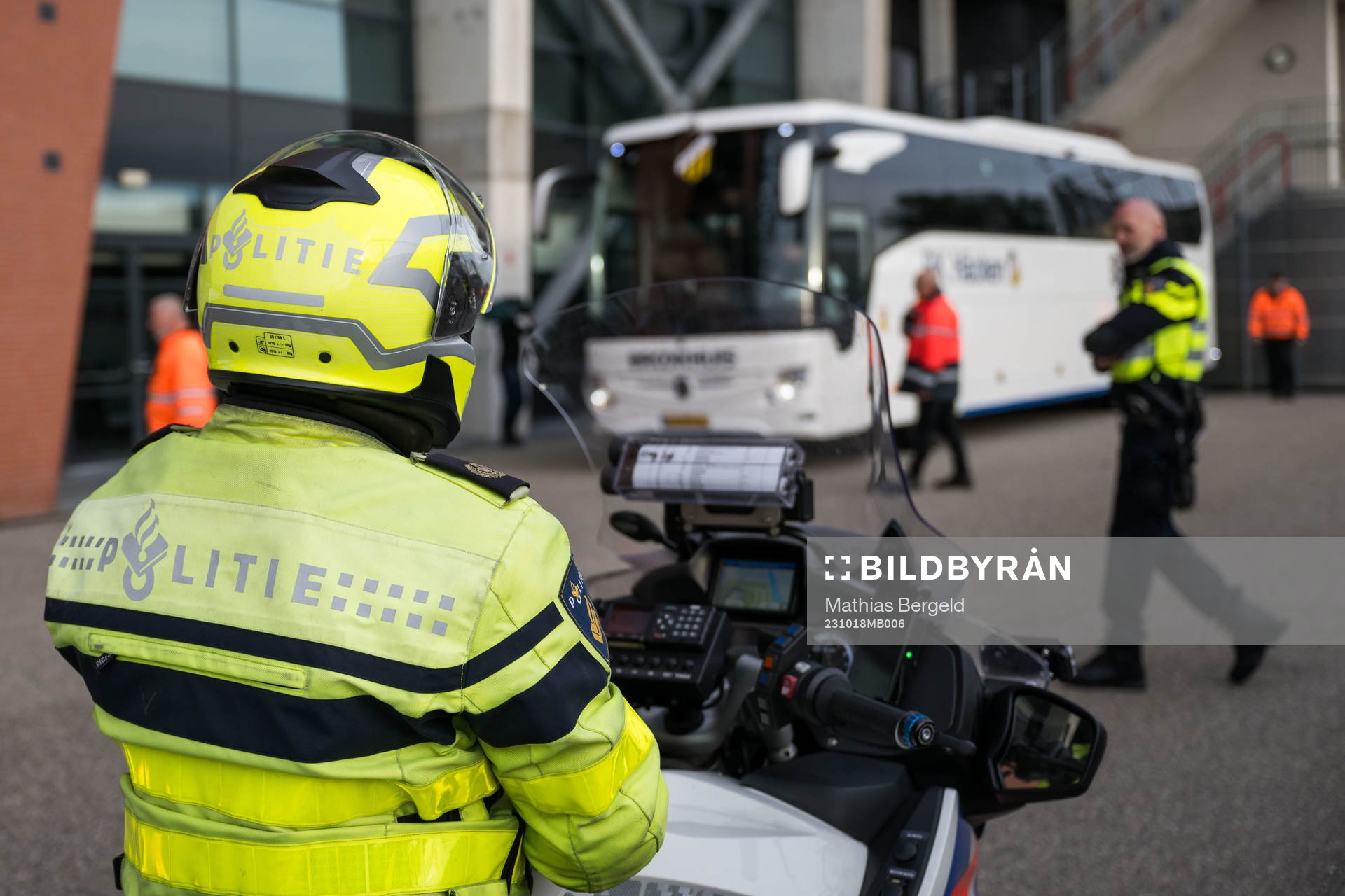 Police watch as the team bus of Häcken arrive