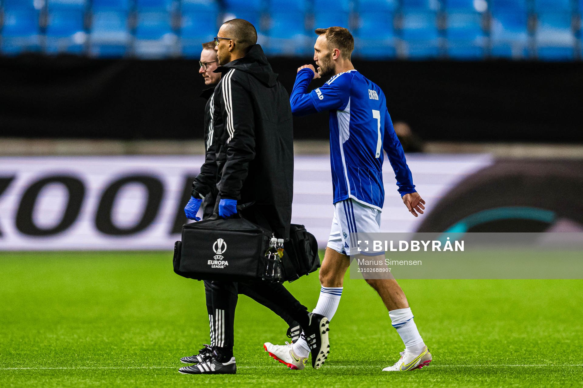 Magnus Wolff Eikrem of Molde walks off the pitch with an