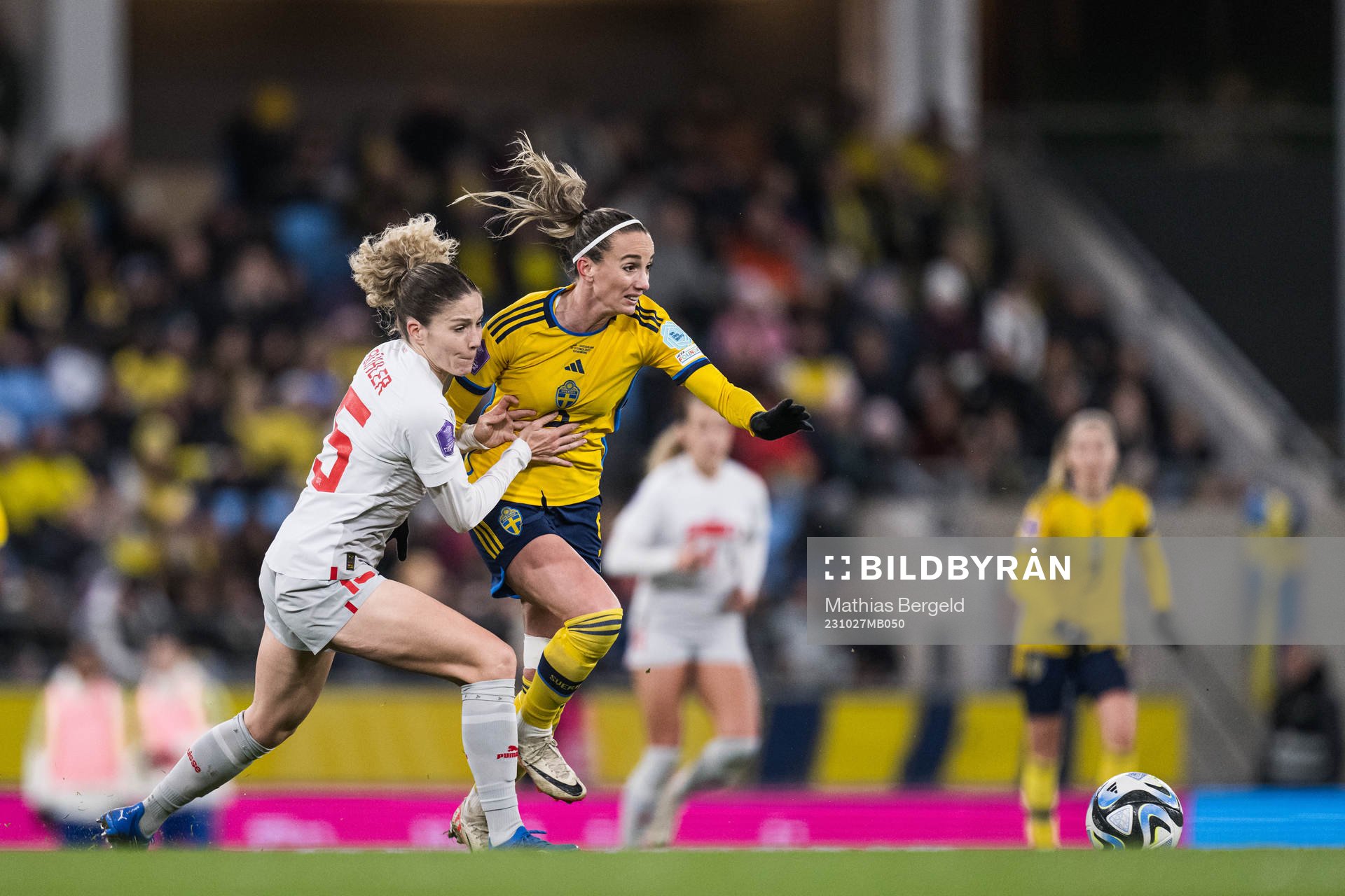 Luana Buhler of Switzerland and Kosovare Asllani of