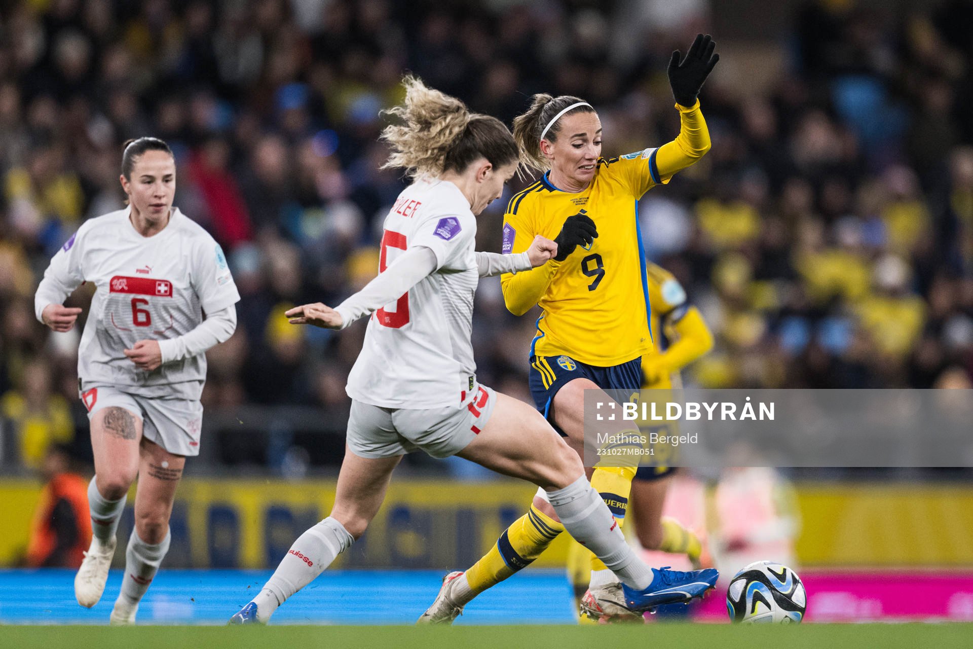 Luana Buhler of Switzerland and Kosovare Asllani of