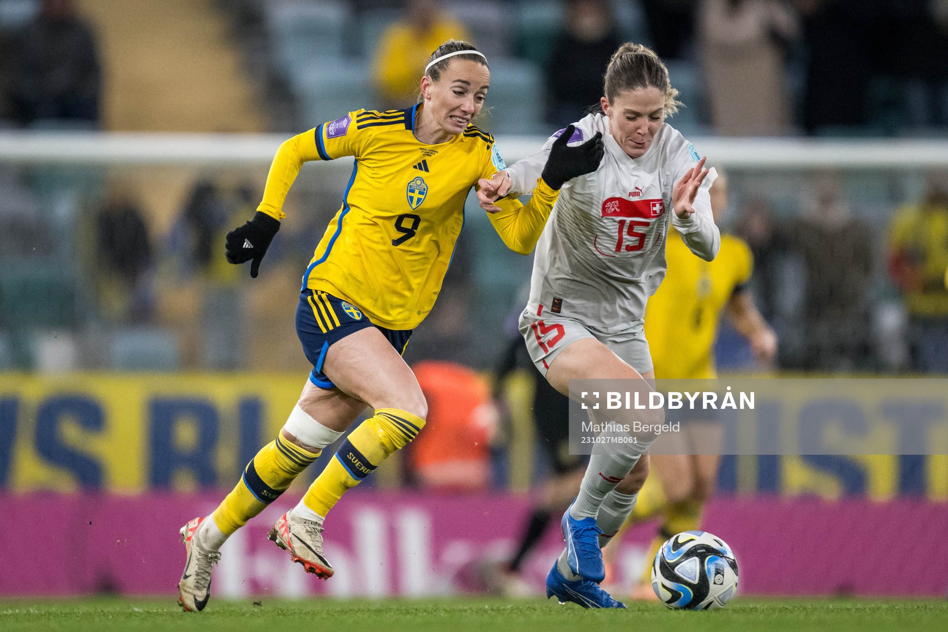 Kosovare Asllani of Sweden and  Luana Buhler of Switzerland