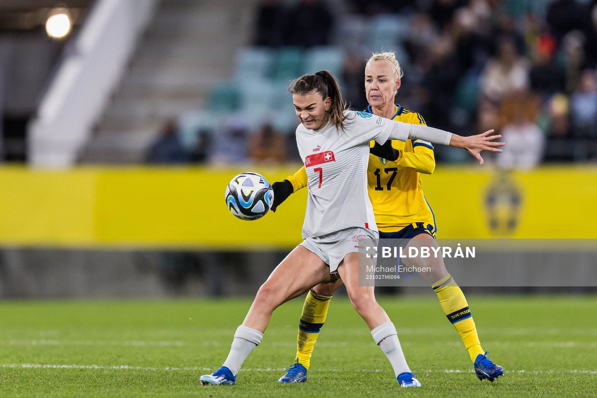 Riola Xhemaili of Switzerland and Caroline Seger of Sweden