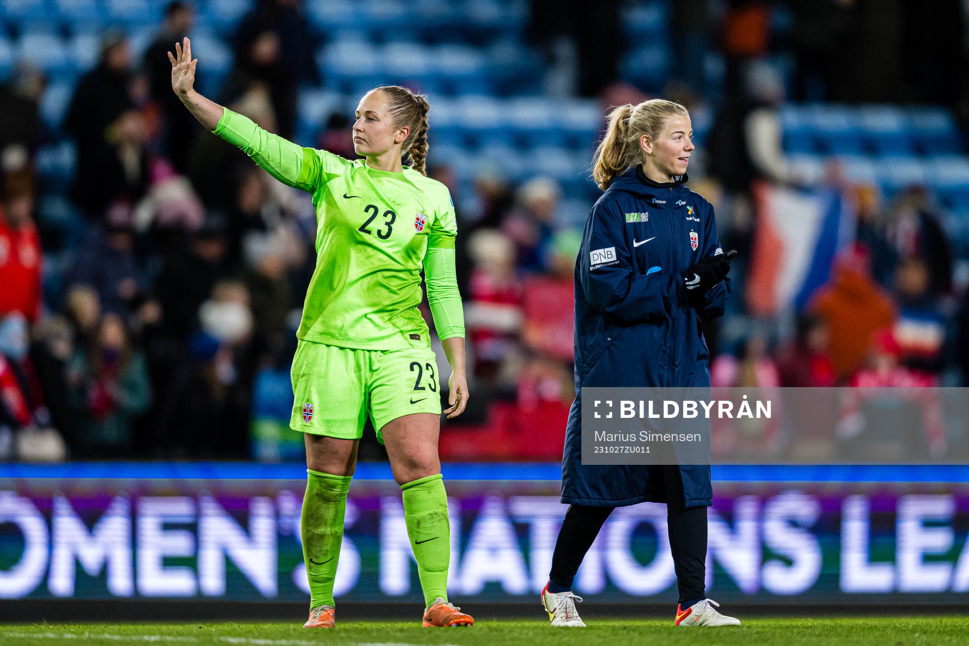 goalkeeper Aurora Mikalsen of Norway and Justine Kielland