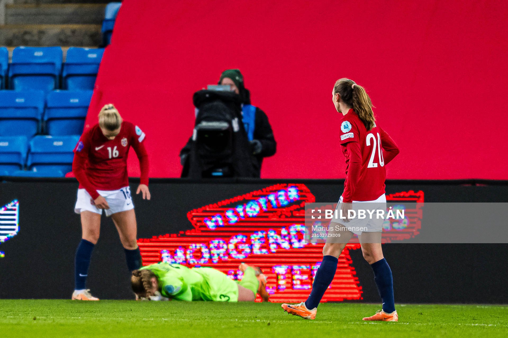 goalkeeper Aurora Mikalsen of Norway in pain