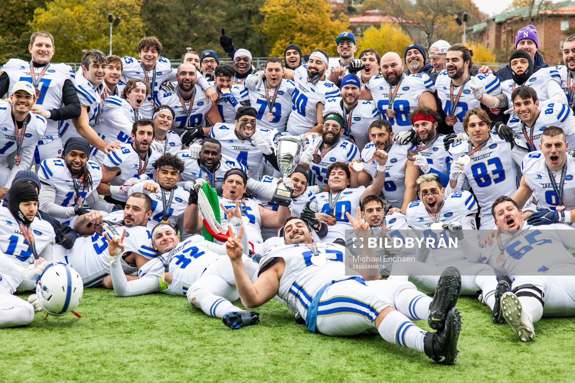 Players of Italy celebrate with the trophy