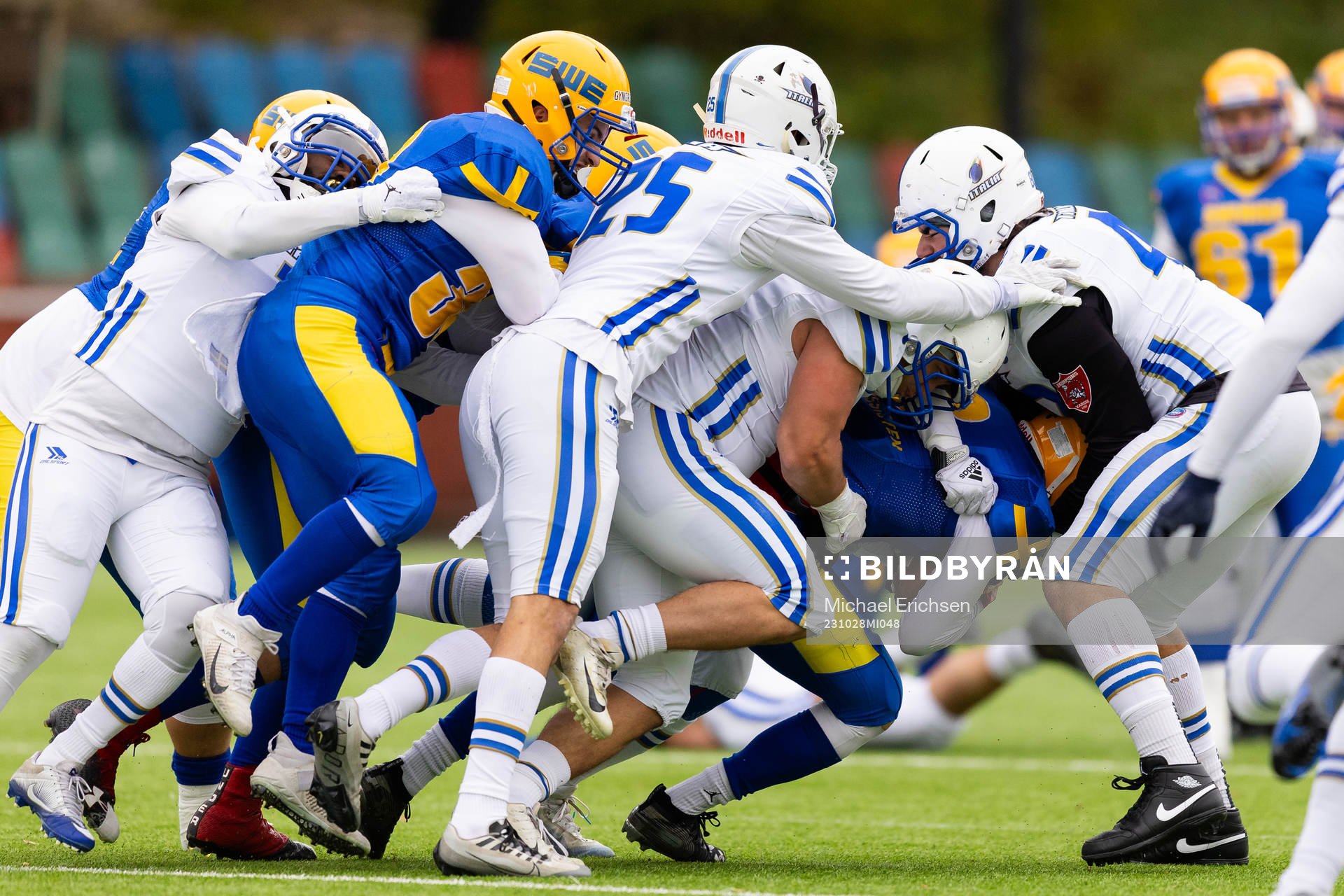 Players of Sweden and of Italy battles for the ball