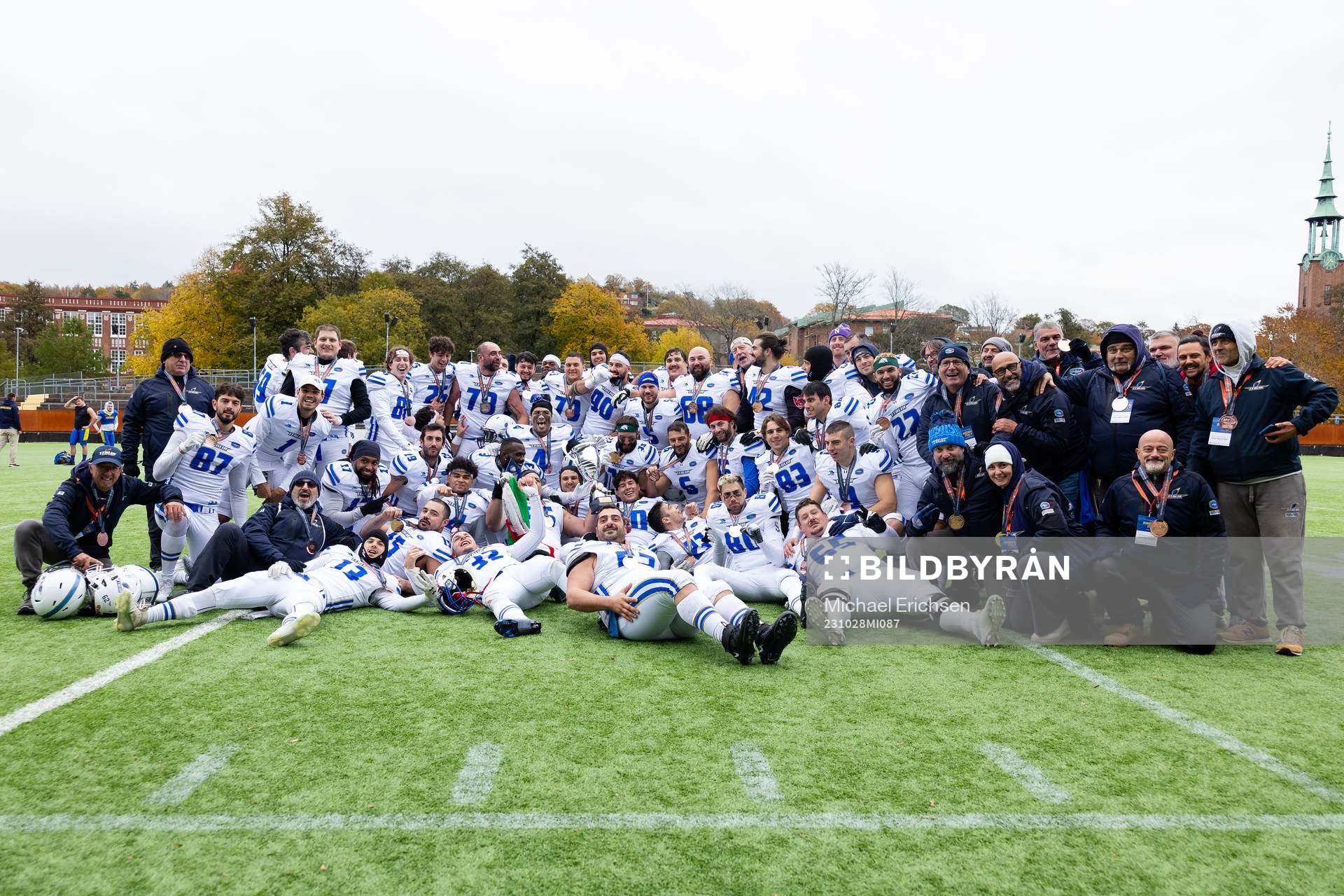 Players and staff of Italy celebrates