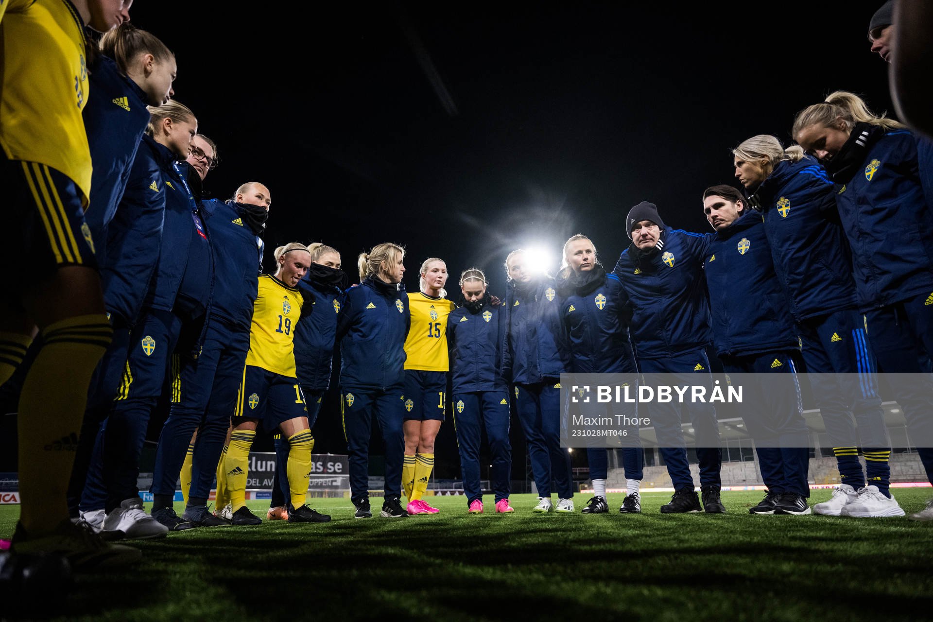 Players and staff of Sweden gather