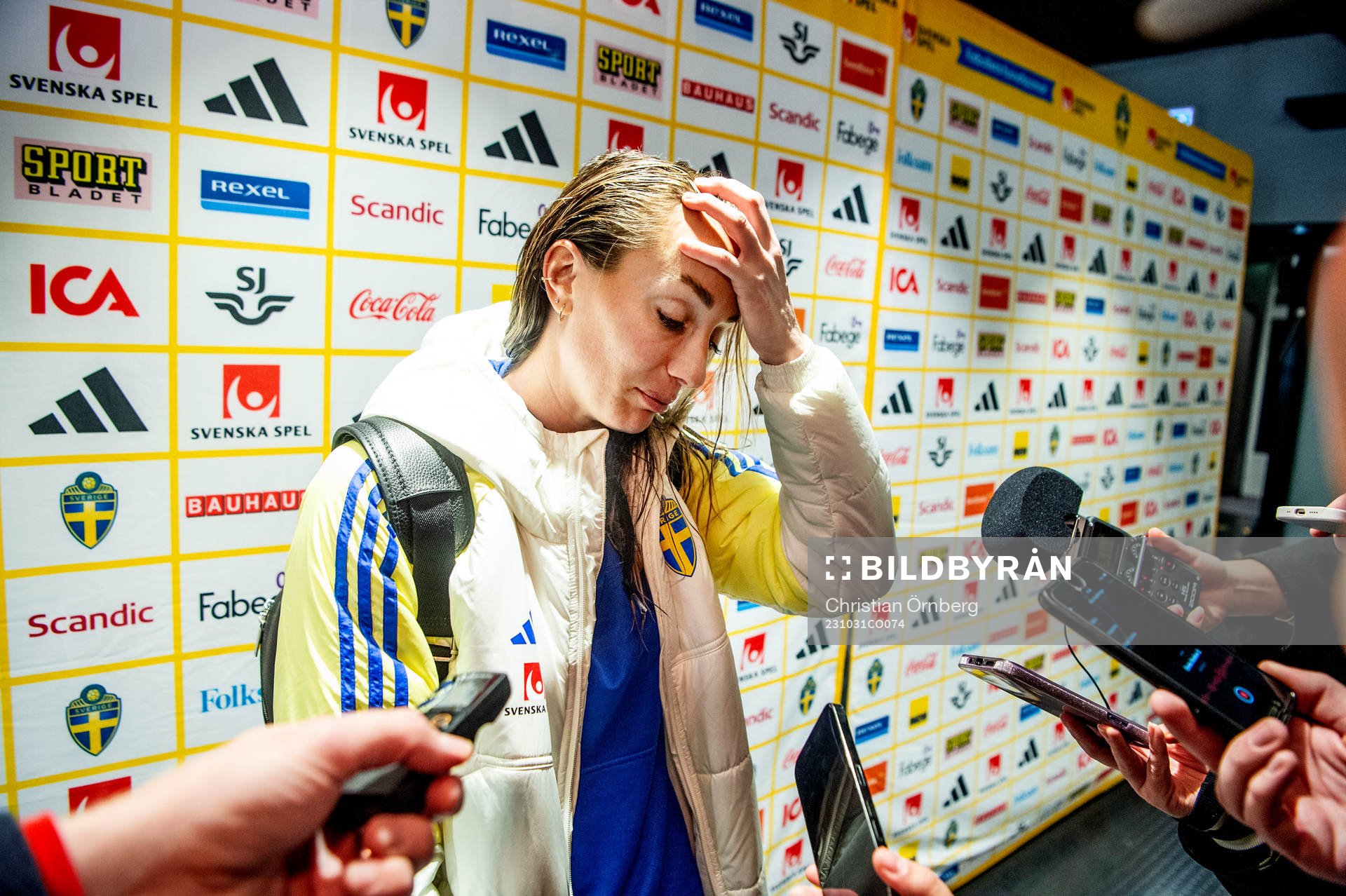 Kosovare Asllani of Sweden in mixed zone