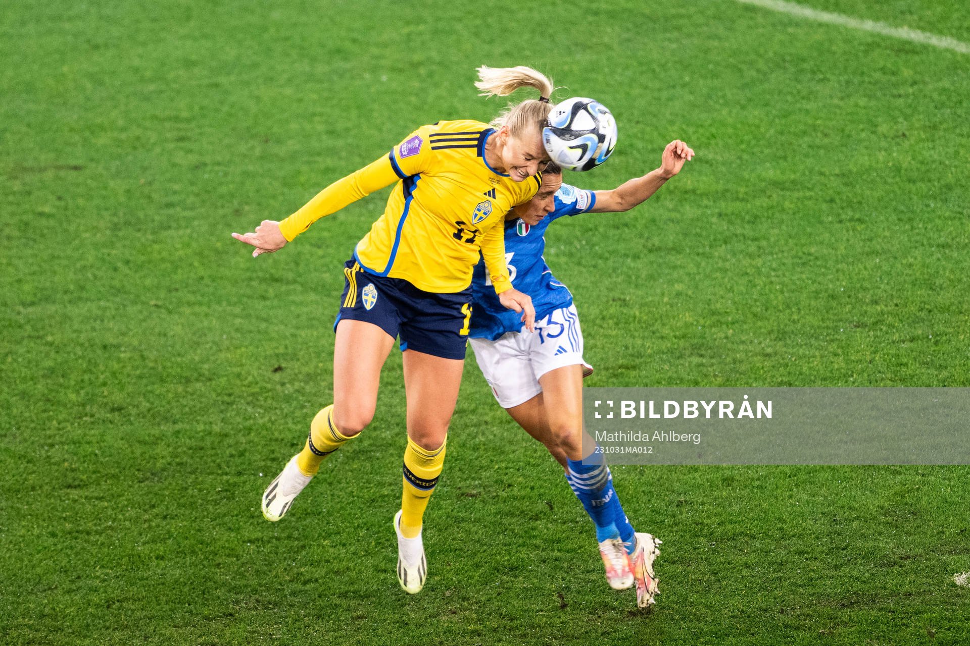 Stina Blackstenius of Sweden and Lucia Di Guglielmo of Italy